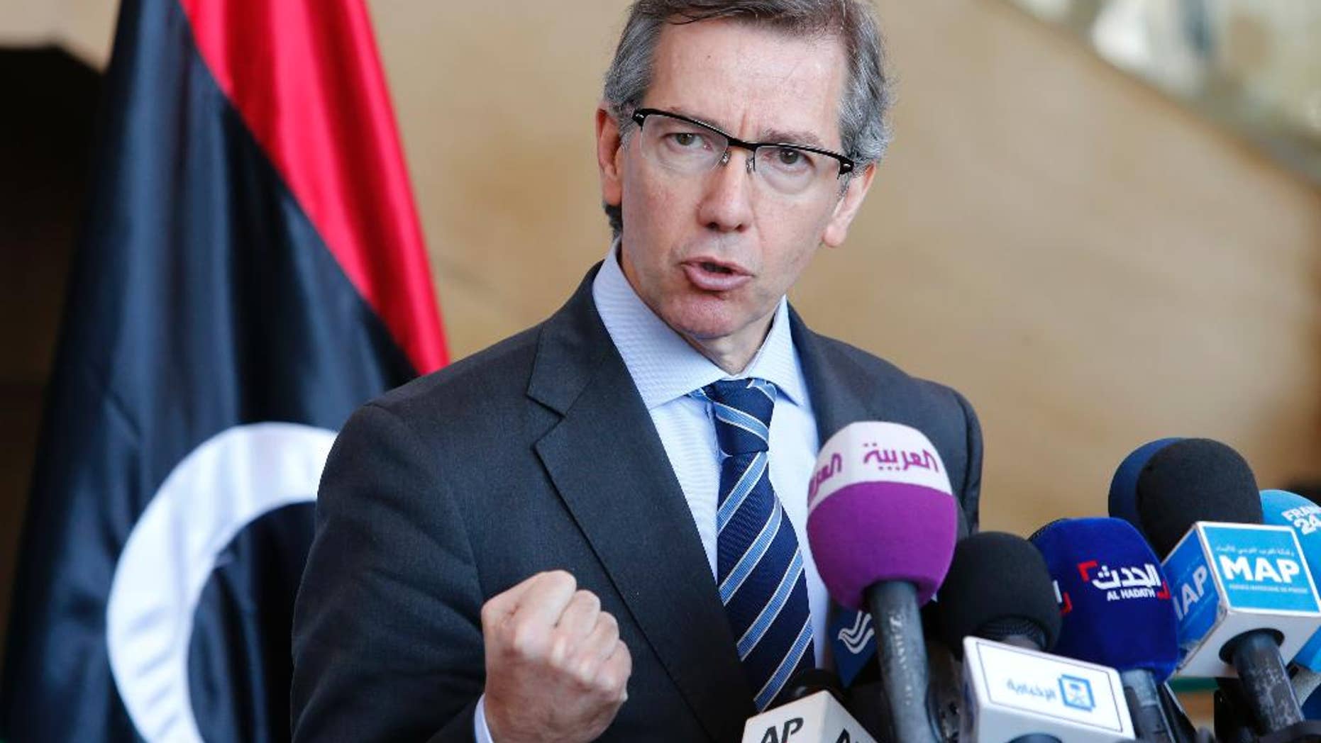 FILE - In this Friday, March 20, 2015 file photo, U.N. special envoy to Libya, Bernardino Leon, speaks during a press conference at the Palais des Congres of Skhirate, 30 kilometers (19 miles) south of Rabat, Morocco. Libya's parliament drops out of U.N.-brokered negotiations in protest against a draft plan for it to share power with its rivals, throwing doubt on what is seen as a last-chance effort to avert the further collapse of the North African nation. (AP Photo/Abdeljalil Bounhar, File)