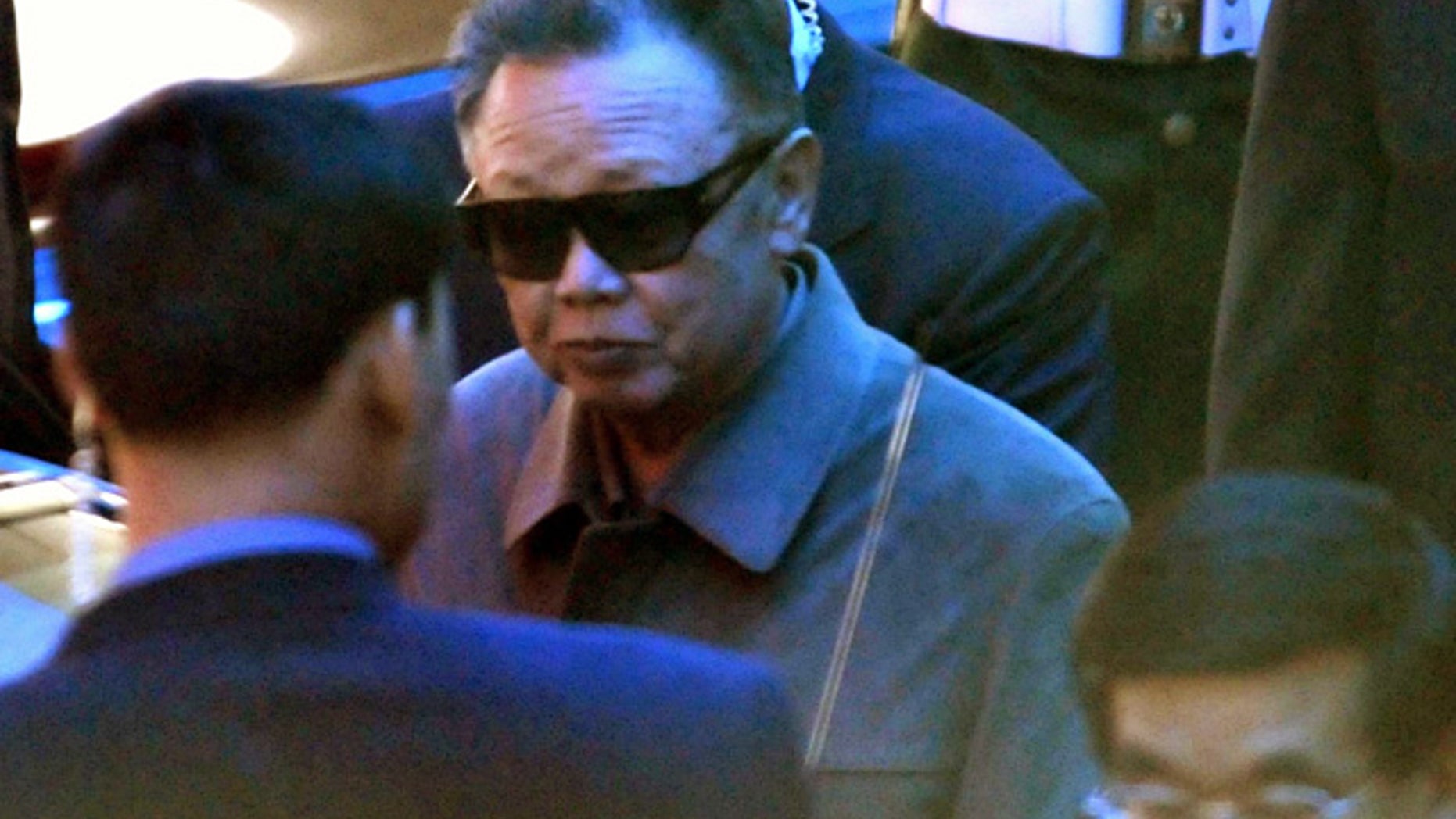 May 3: North Korean leader Kim Jong Il leaves a hotel in Dalian, northeastern China.