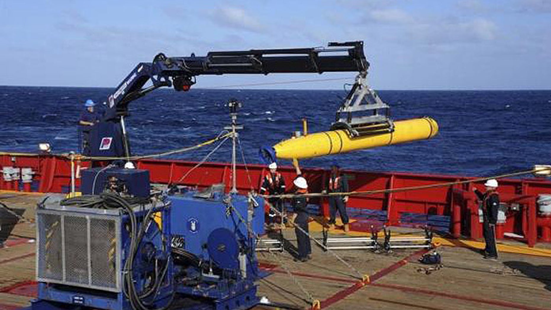 The Bluefin 21, the Artemis autonomous underwater vehicle (AUV), is hoisted back on board the Australian navy's Ocean Shield in the southern Indian Ocean. (U.S. Navy)