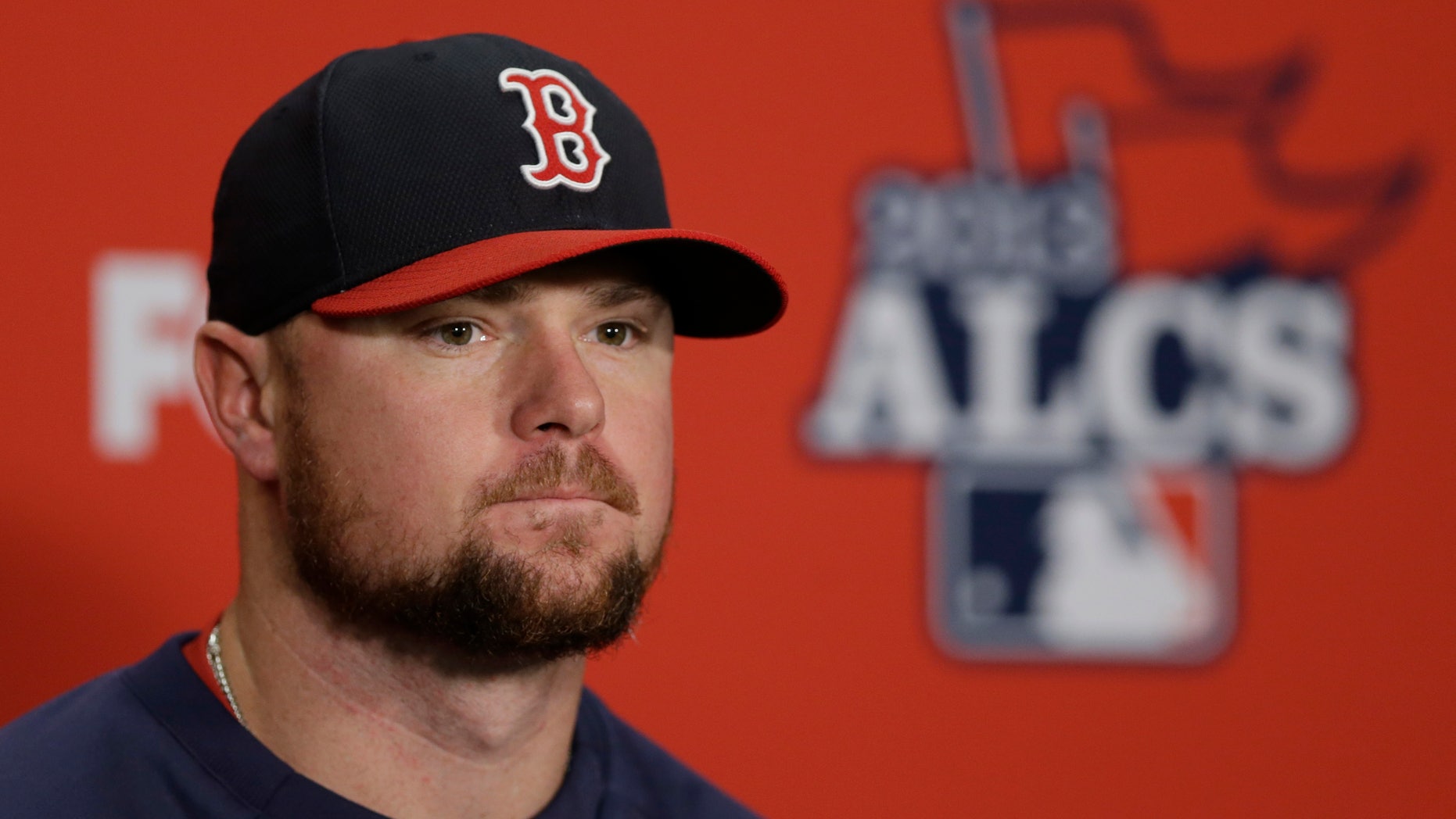 Boston Red Sox's Jon Lester listens to a question during a news conference before Game 4 of the American League baseball championship series against the Detroit Tigers Wednesday, Oct. 16, 2013, in Detroit. Lester is expected to be the Game 5 starter for Boston. (AP Photo/Carlos Osorio)