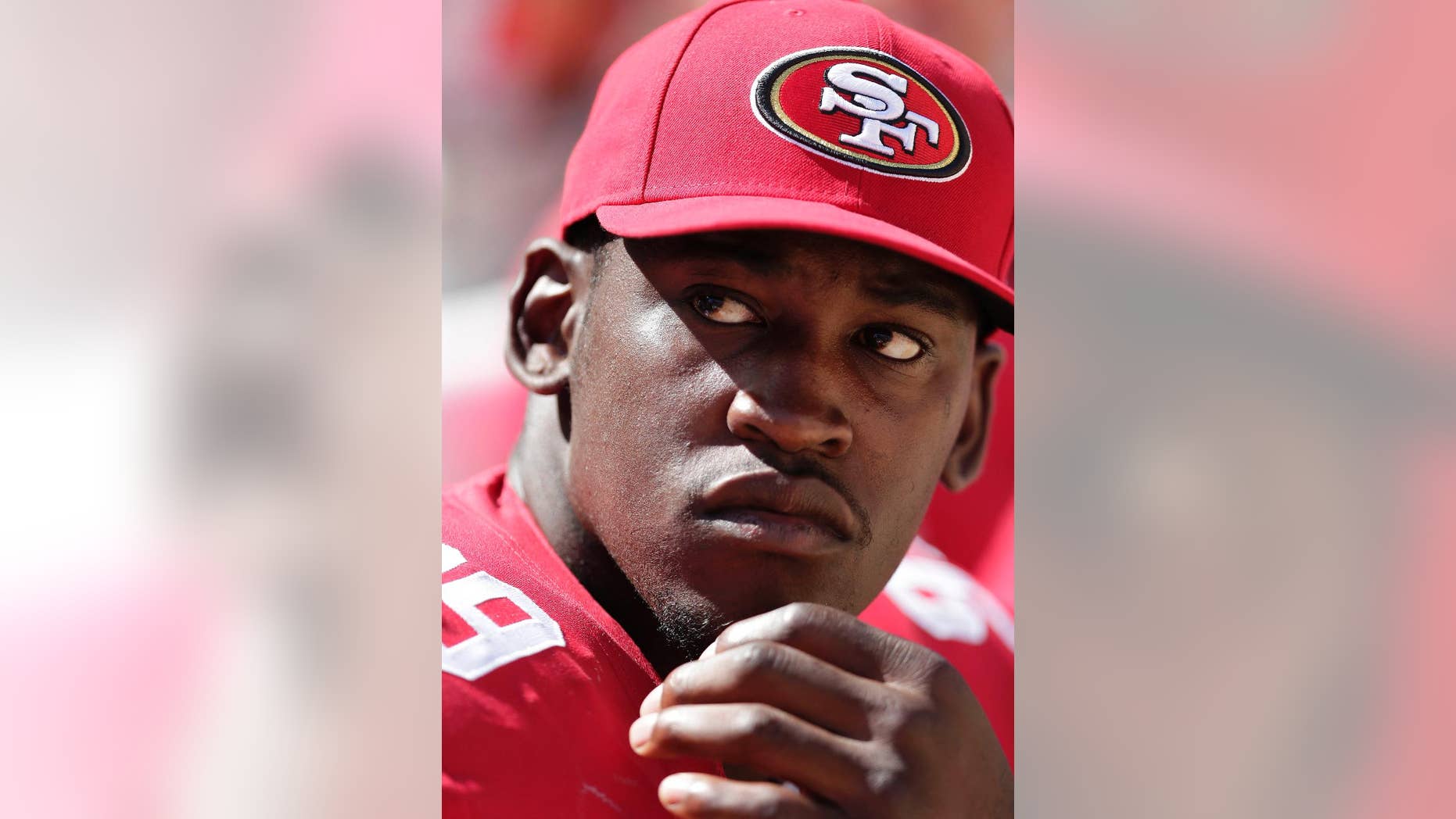 File - In this Aug. 24, 2014, file photo, San Francisco 49ers linebacker Aldon Smith sits on the sideline during the second half of an NFL preseason football game against the San Diego Chargers in Santa Clara, Calif. Smith has missed 14 games in the past two seasons, including the first nine this year serving his supsension for violations of the NFL's substance-abuse and personal-conduct policies. Now, the star San Francisco linebacker is likely to make his 2014 debut Sunday, Nov. 16, at the New York Giants hoping to regain the form that made him one of the league's fiercest and dominant pass rushers. (AP Photo/Marcio Jose Sanchez, File)