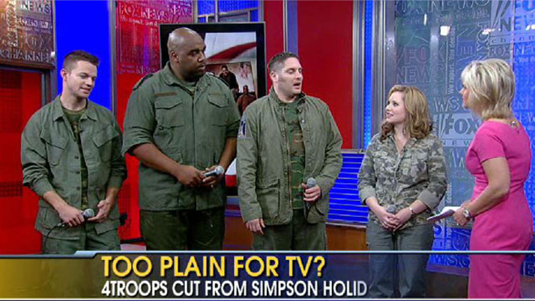 Singing quartet 4Troops says producers for Jessica Simpson's holiday special snubbed them because they didn't wear tuxedos for their performance with the singer.