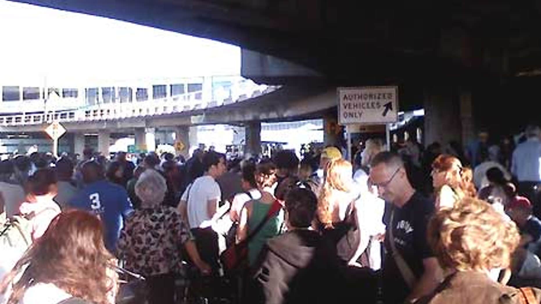 Aug. 1: The main terminal in New York City's LaGuardia Airport was evacuated Saturday morning after a man carrying a fake bomb in his bag was stopped.