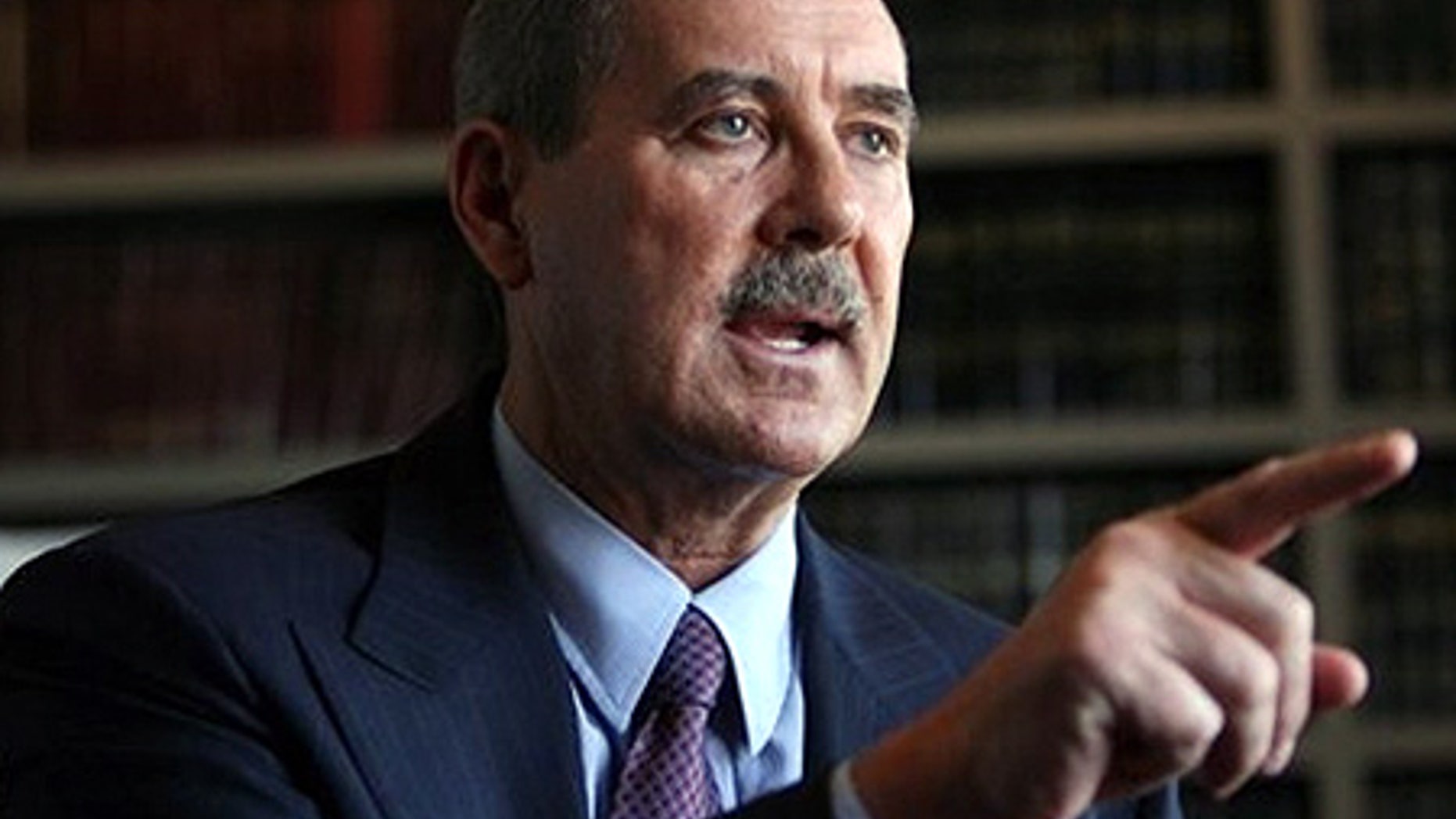 Apr. 20: R. Allen Stanford in the office of attorney Dick DeGuerin in Houston.