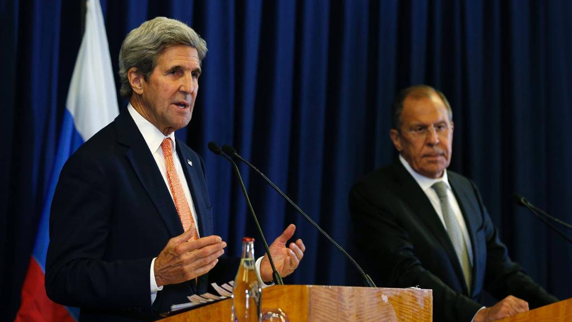 U.S. Secretary of State John Kerry and Russian Foreign Minister Sergey Lavrov hold a press conference following their meeting in Geneva, where they discussed the crisis in Syria, Friday, Sept. 9, 2016. (Kevin Lamarque/Pool Photo via AP)