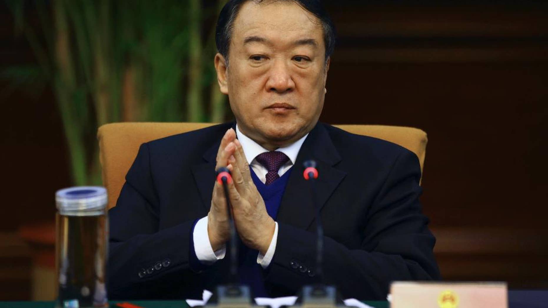 In this March 6, 2012 photo, Su Rong, ex-vice chairman for the Chinese People's Political Consultative Conference (CPPCC) attends a group session during the National People's Congress in Beijing. Chinese authorities say the former vice chairman for the country's top political advisory body has been expelled from the Communist Party and stripped of all government positions because of bribery. The Central Commission for Discipline Commission, the Communist Party's top watchdog agency, said Monday, Feb. 16, 2015 in a written statement that Su, took "huge amounts of bribes" and sought promotions for cadres and benefits for businesses. (AP Photo) CHINA OUT
