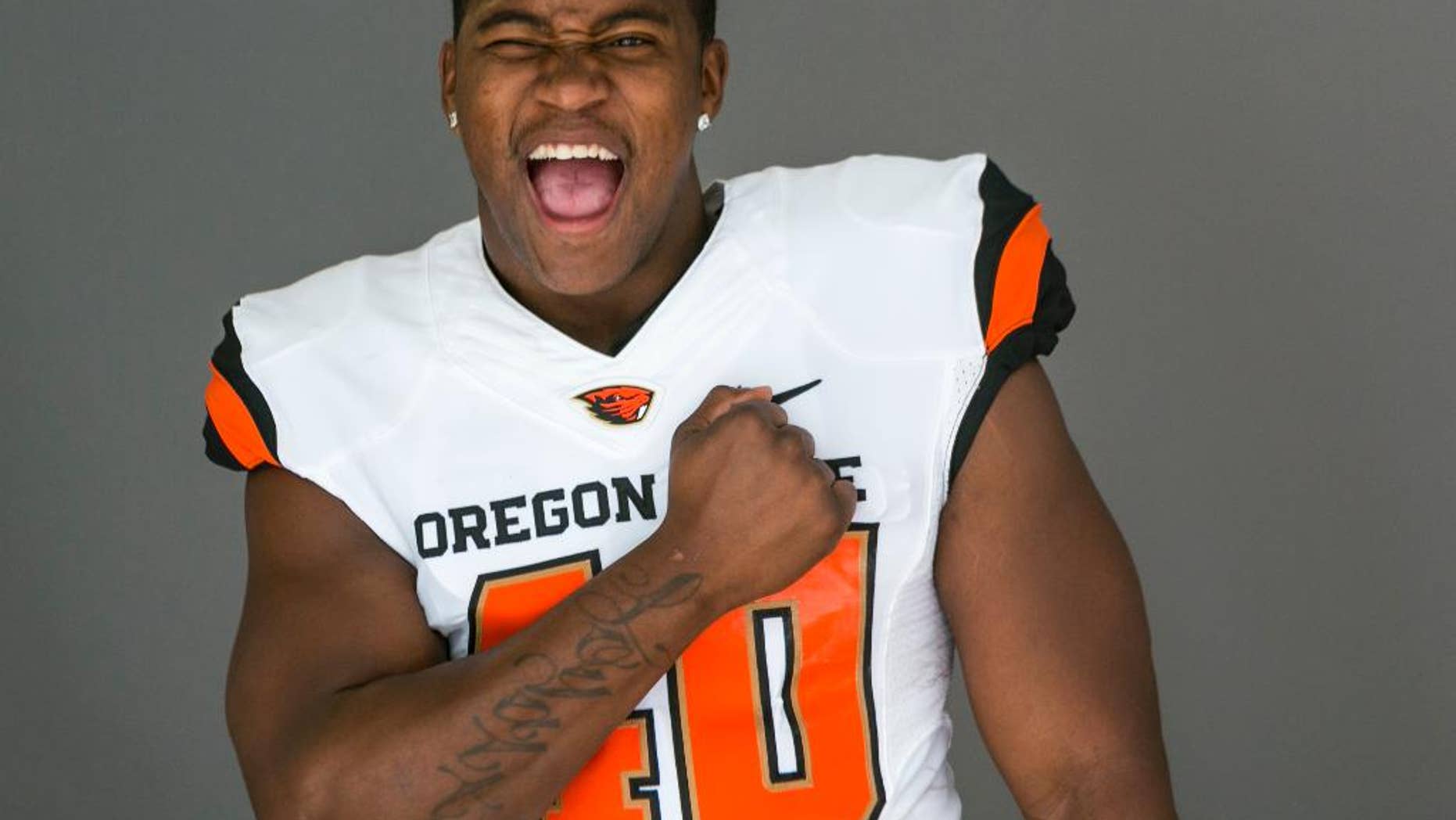FILE - In this July 24, 2014, file photo, Oregon State linebacker Michael Doctor poses for a photo at the 2014 Pac-12 NCAA college football media days at Paramount Studios in Los Angeles. The normally unshakable Doctor was a little nervous. After his senior season was cut short by a fractured ankle, Oregon State requested another year of eligibility for the outside linebacker. Doctor can rest easy. He's been green-lighted for one more season. (AP Photo/File)