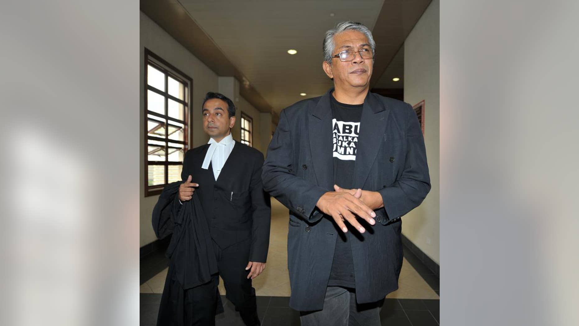 File photo of Malaysian social activist Haris Ibrahim at the High Court in Kuala Lumpur on May 29, 2013. Ibrahim, who faces sedition charges at home has said he was denied a visa to enter Australia.