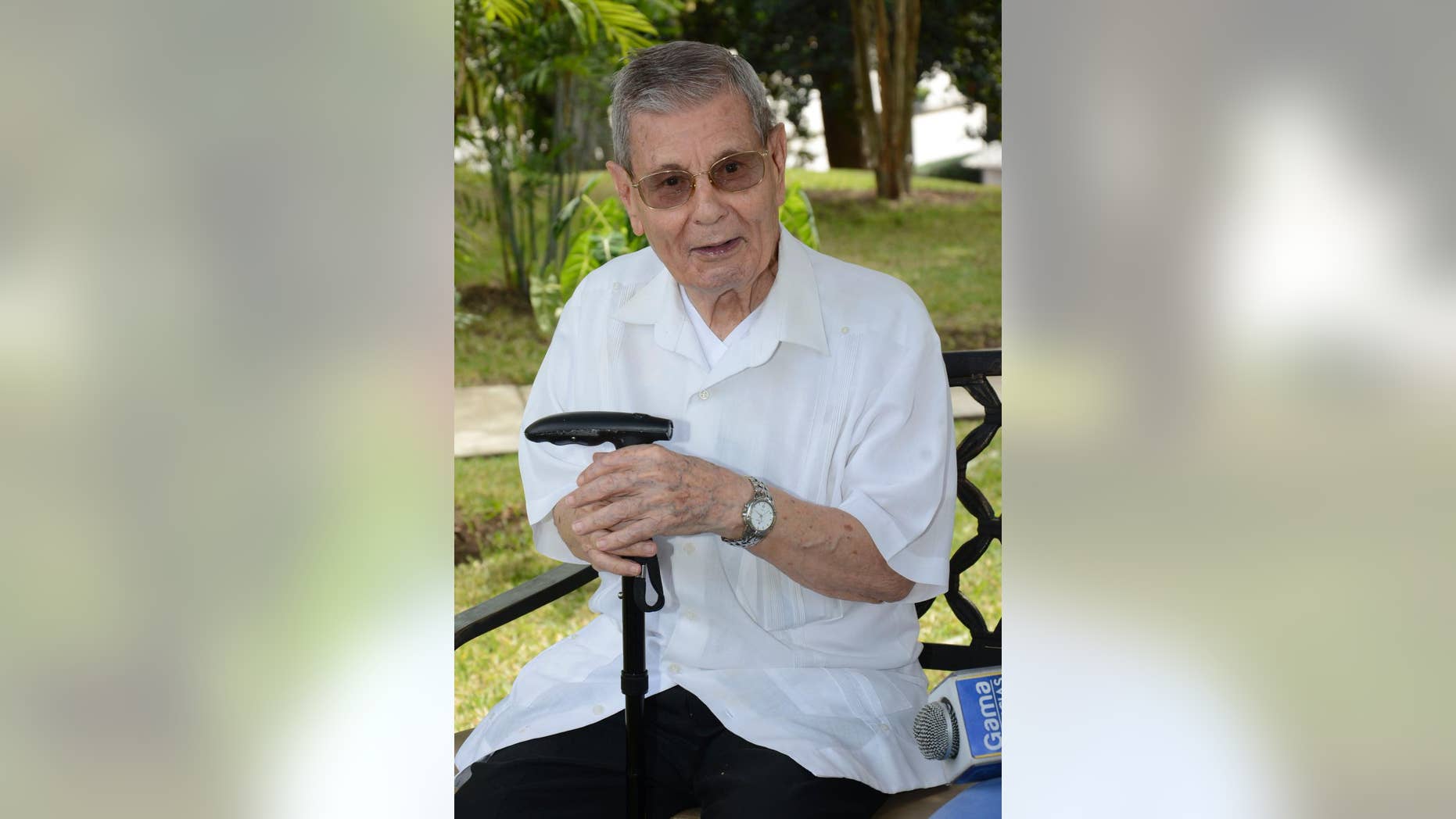 In this July 2, 2015 photo released by El Diario in Ecuador, Spanish Priest Francisco Cortes Garcia, affectionately known as "Father Paquito," talks to reporters at the Javier school where he's the director and teaches, in Guayaquil, Ecuador. Paquito will meet with Pope Francis, a friend since the 1980's, during the pope's upcoming visit to Guayquil. (El Diario/Darwin Romero via AP)