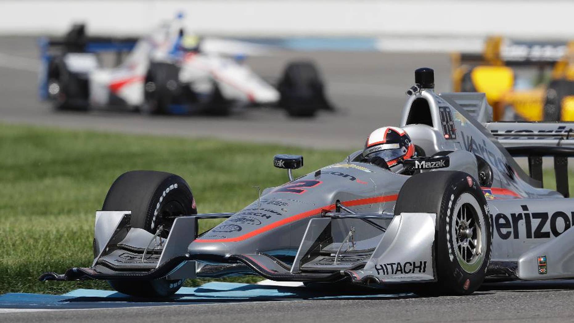 Juan Pablo Montoya, of Colombia, steers his car during practice session for the Grand Prix of Indianapolis auto race at Indianapolis Motor Speedway in Indianapolis, Thursday, May 12, 2016. (AP Photo/Darron Cummings)