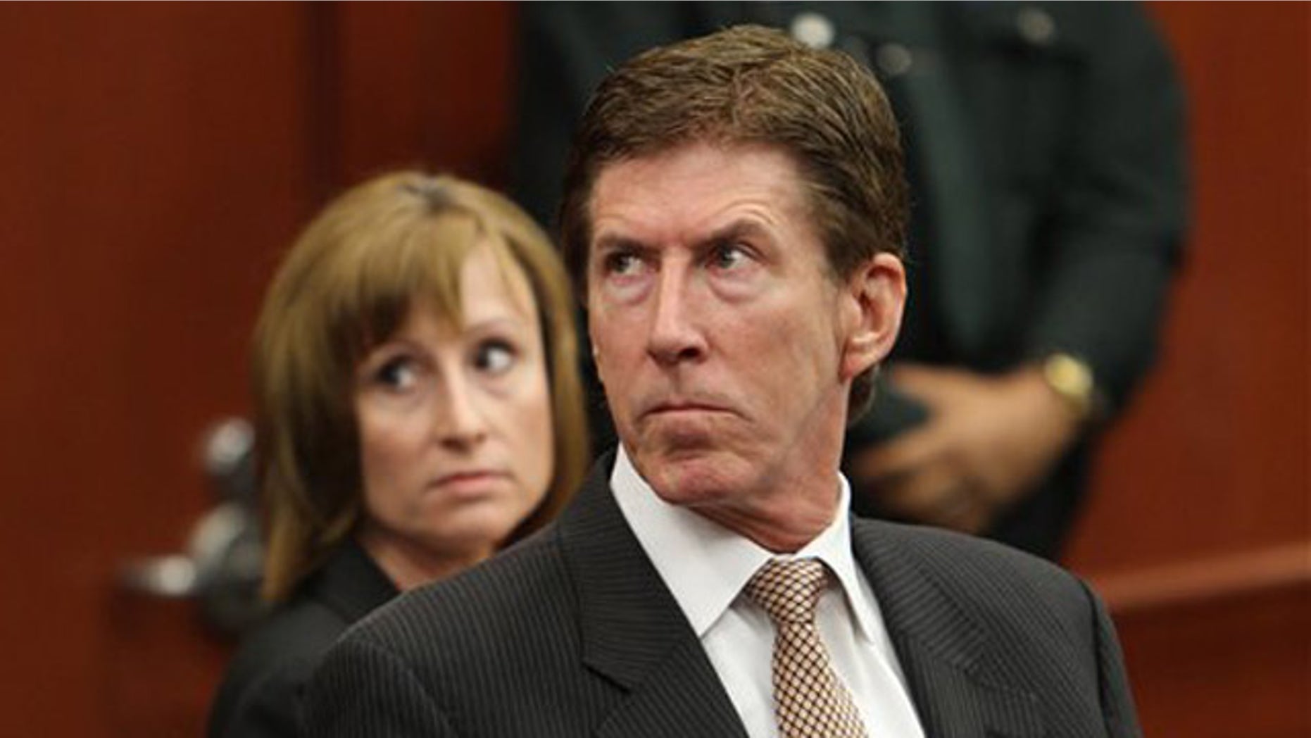 April 27, 2012: Attorney Mark O'Mara, right, and associate Lorna Truett appear in court on behalf of their client George Zimmerman during a hearing in his trial in Sanford, Fla.