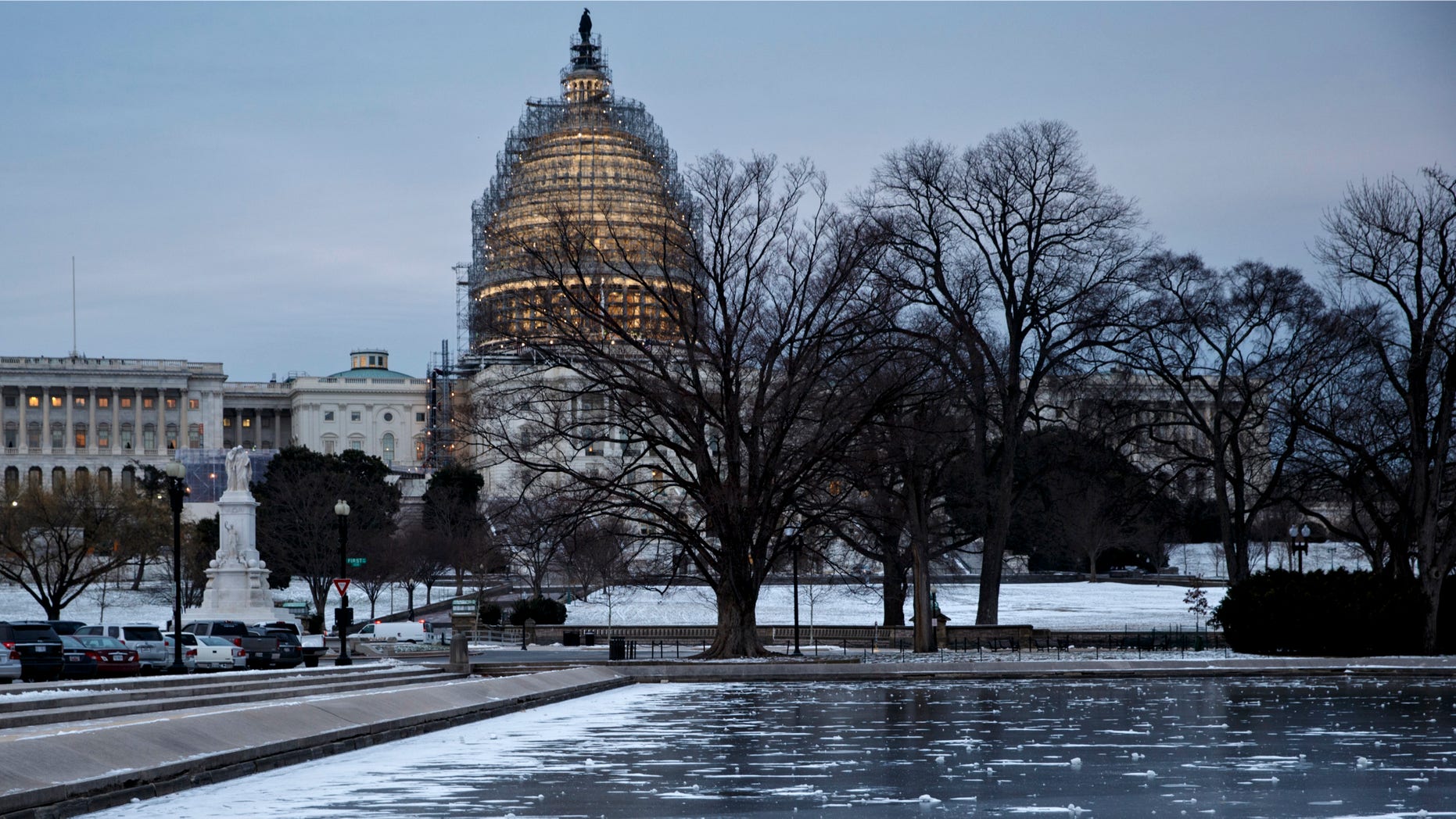 Sub-freezing temperatures continue in on Capitol Hill in Washington early Friday morning, Jan. 9, 2015. With the end of the first week of the GOP controlled 114th Congress, House Republicans are on track to easily pass legislation to authorize the construction of the Keystone XL oil pipeline, moving the GOP-led Congress closer to a clash with President Barack Obama. (AP Photo/J. Scott Applewhite)