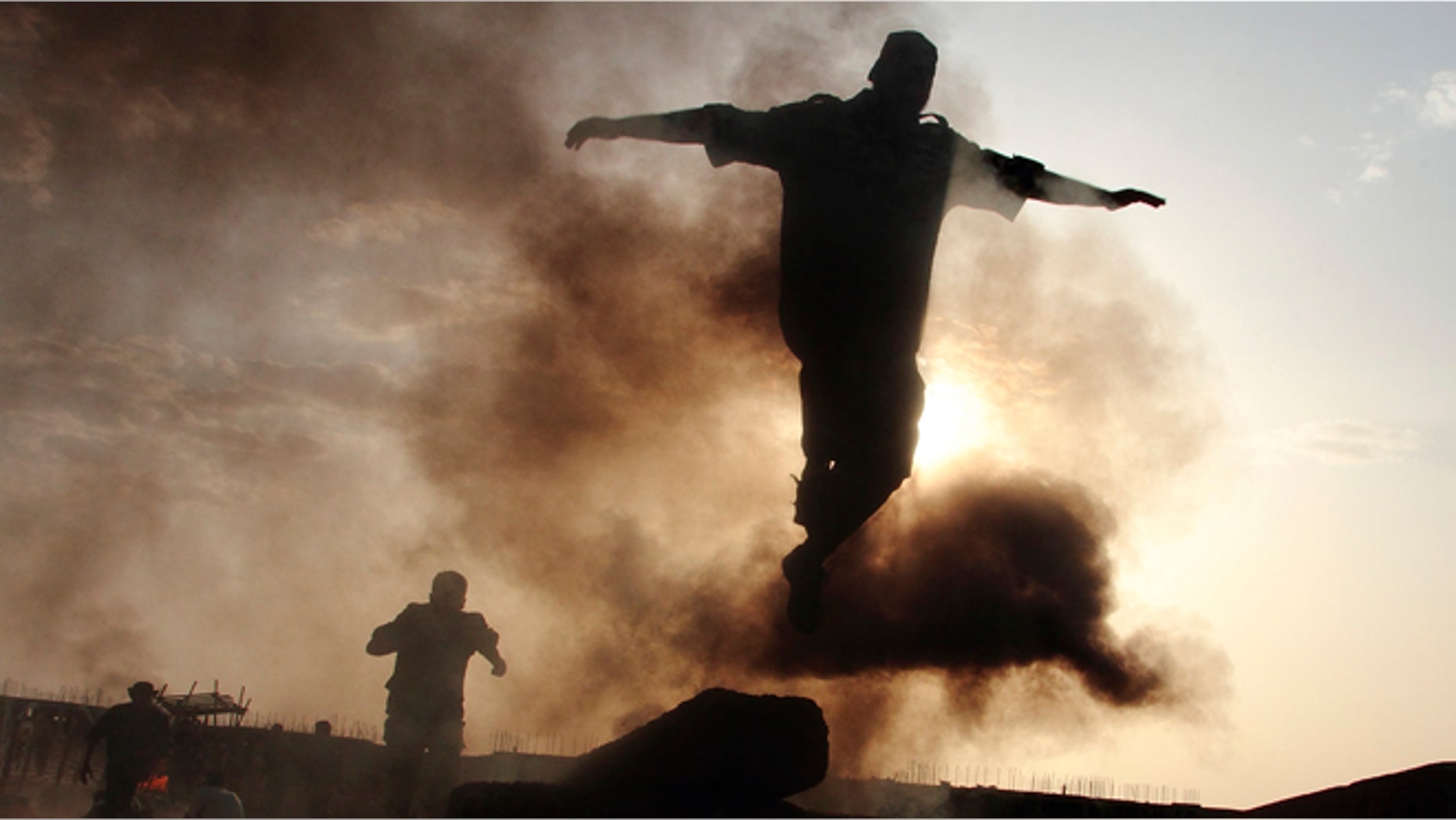 July 18: Libyan rebel cadets train to become freedom fighters in Kabaw's military academy in Libya's western mountains.