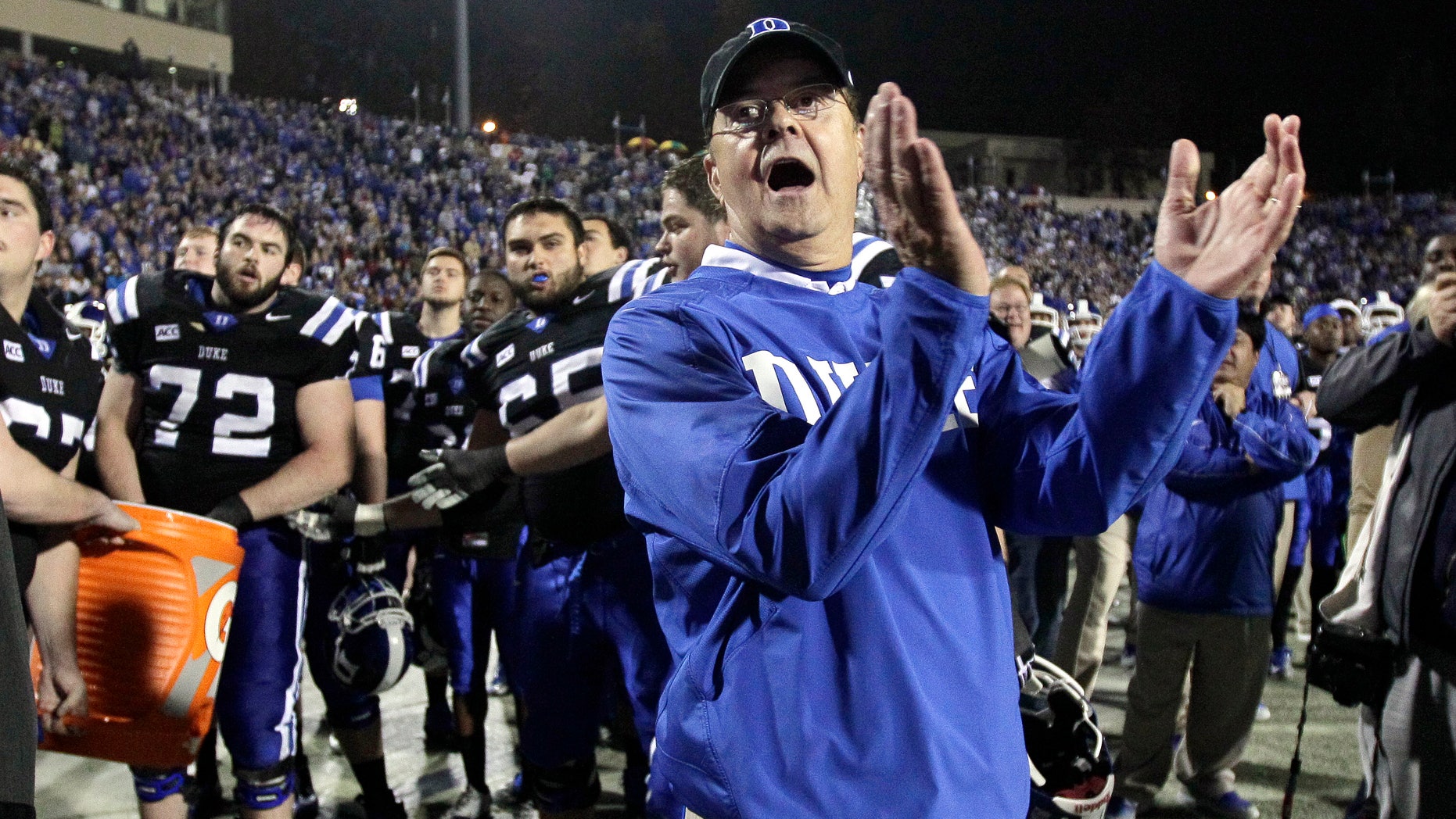 FILE - In this Nov. 16, 2013 file photo, Duke coach David Cutcliffe watches from the sidelines during the second half of an NCAA college football game against Miami in Durham, N.C. Florida State quarterback Jameis Winston is the Atlantic Coast Conference's rookie of the year and Cutcliffe is its coach of the year for the second straight season. The league also announced Tuesday, Dec. 3, 2013, that Virginia Tech cornerback Kendall Fuller is its defensive rookie of the year. (AP Photo/Gerry Broome, File)