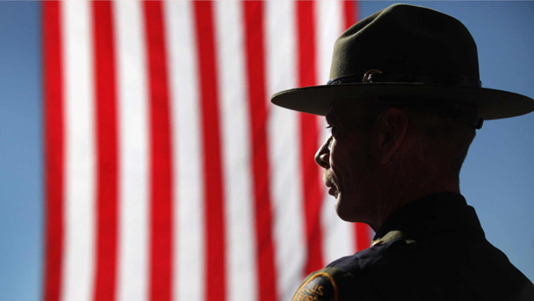 TUCSON, AZ - JANUARY 21: U.S. Border Patrol agent Michael Wagenen attends a memorial service for slain comrade Brian Terry on January 21, 2011 in Tucson, Arizona. Agent Terry was killed during a December14 shootout with suspected bandits near the U.S.-Mexico Border. Thousands of Border Patrol agents and fellow law enforcement officers from across Arizona turned out for the memorial service held at Kino baseball stadium in Tucson. With U.S. agents tracking drug smugglers and illegal immigrants all along the border, the region has become one of the most militarized areas of the United States. (Photo by John Moore/Getty Images)