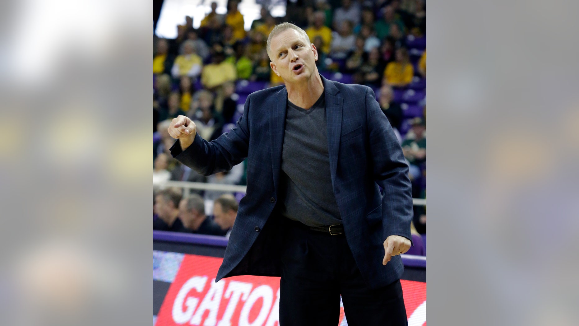 TCU head coach Jeff Mittie gestures from the sideline during the first half of an NCAA college basketball game against the Baylor Saturday, Feb. 22, 2014, in Fort Worth, Texas. (AP Photo/LM Otero)