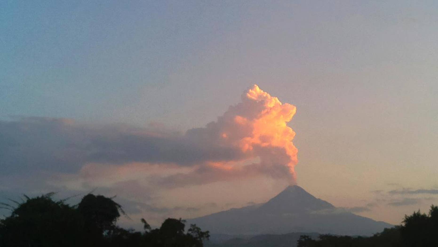 Steam and ash rises from the Colima volcano Friday, Oct. 30, 2016. Eruptions at the Colima volcano in western Mexico have led authorities to evacuate two small hamlets on the volcano’s slopes. The government of the state of Colima said 230 people had been evacuated from the hamlet of La Becerra and 80 from Yerbabuena. Civil defense officials said some went to a shelter in the town of Comala. (AP Photo/Dario Lopez-Mills)