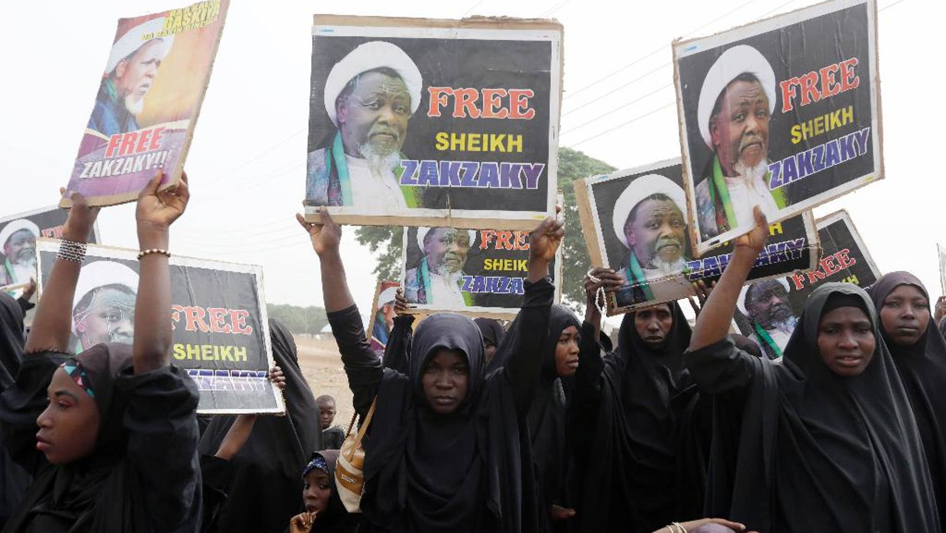 Nigeria Shiite Muslims take to the street to protest and demanded the release of Shiite leader Ibraheem Zakzaky in Cikatsere, Nigeria, Friday, April 1, 2016. Hundreds of Shiites were reportedly killed in an army raid in Nigeria last year.(AP Photo/Sunday Alamba)