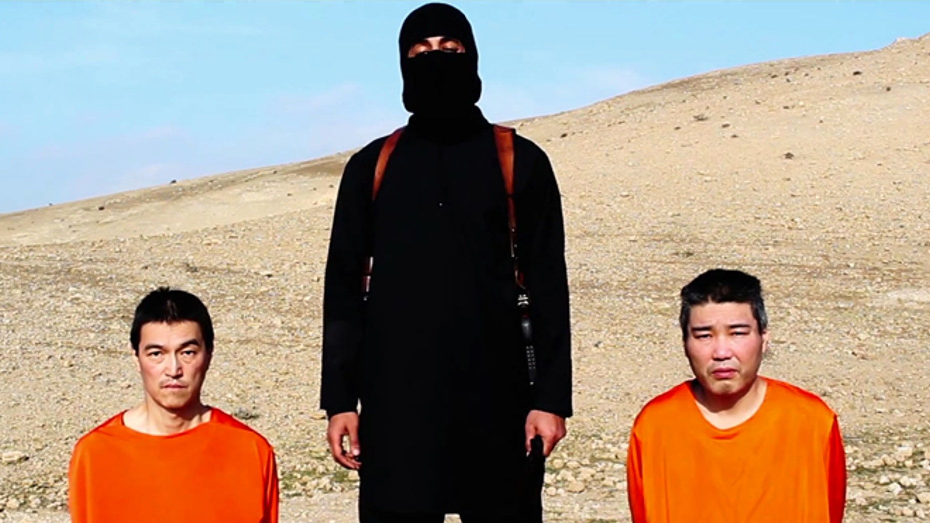 Jan. 20, 2015: This image taken from an online video released by the Islamic State's al-Furqan media arm, purports to show the group threatening to kill two Japanese hostages that the militants identify as Kenji Goto Jogo, left, and Haruna Yukawa, right, unless a $200 million ransom is paid within 72 hours.
