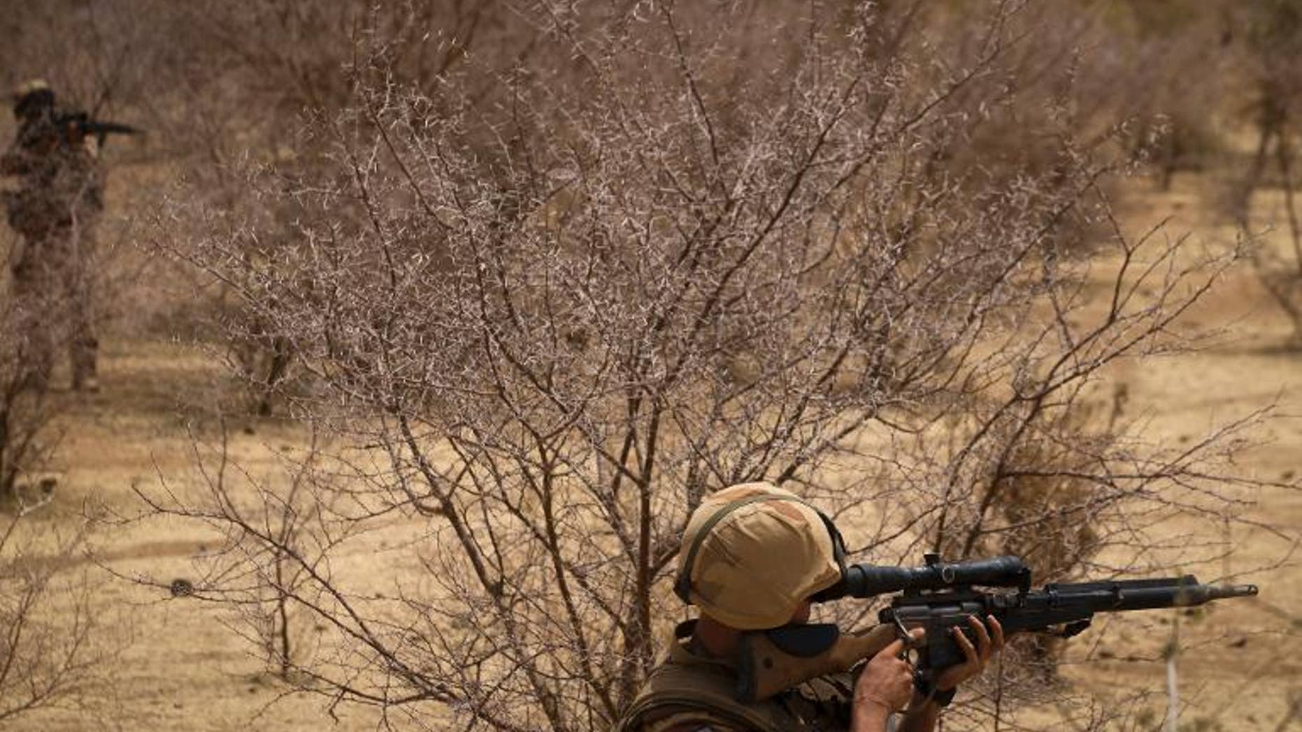 A French soldier on April 10, 2013, hunts for Islamist fighters in a valley in northern Mali