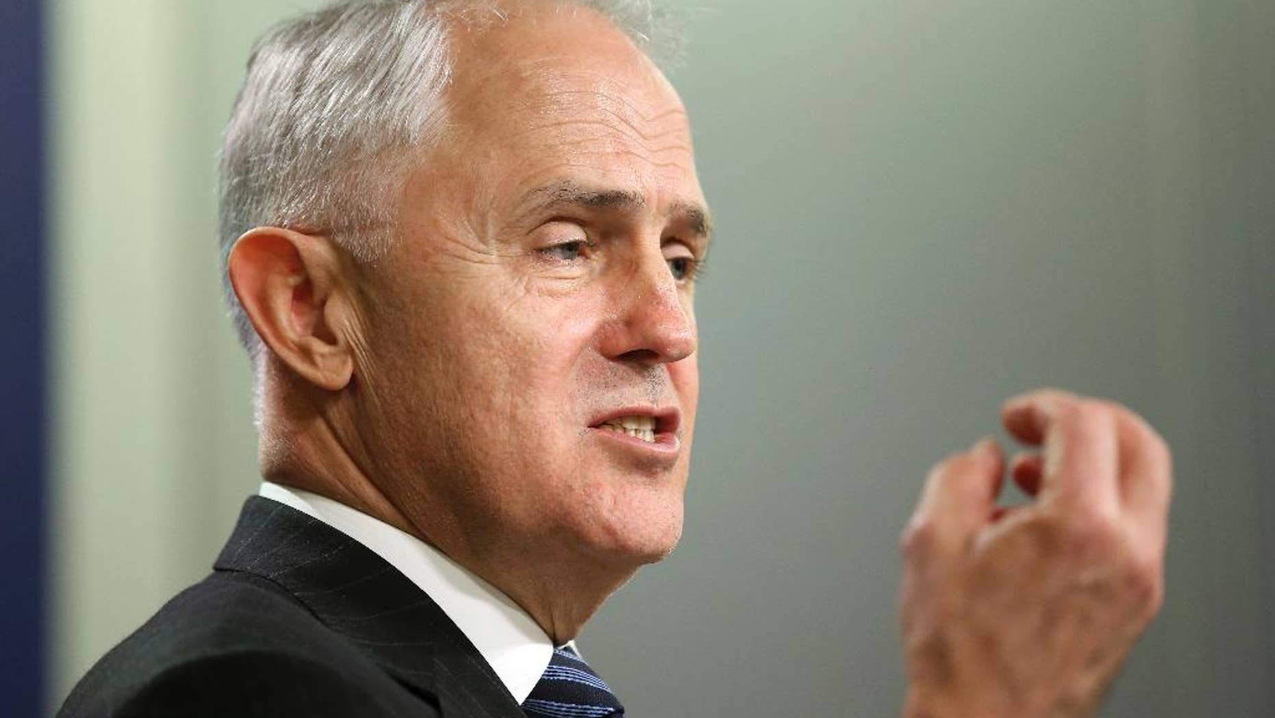 In this Aug. 10, 2016 photo, Australian Prime Minister Malcolm Turnbull addresses the media from the government offices in Sydney. Turnbull said Tuesday, April 18, 2017, that the country will scrap a temporary visa for skilled foreign workers, arguing that Australians must be given priority for Australian jobs. (AP Photo/Rick Rycroft)