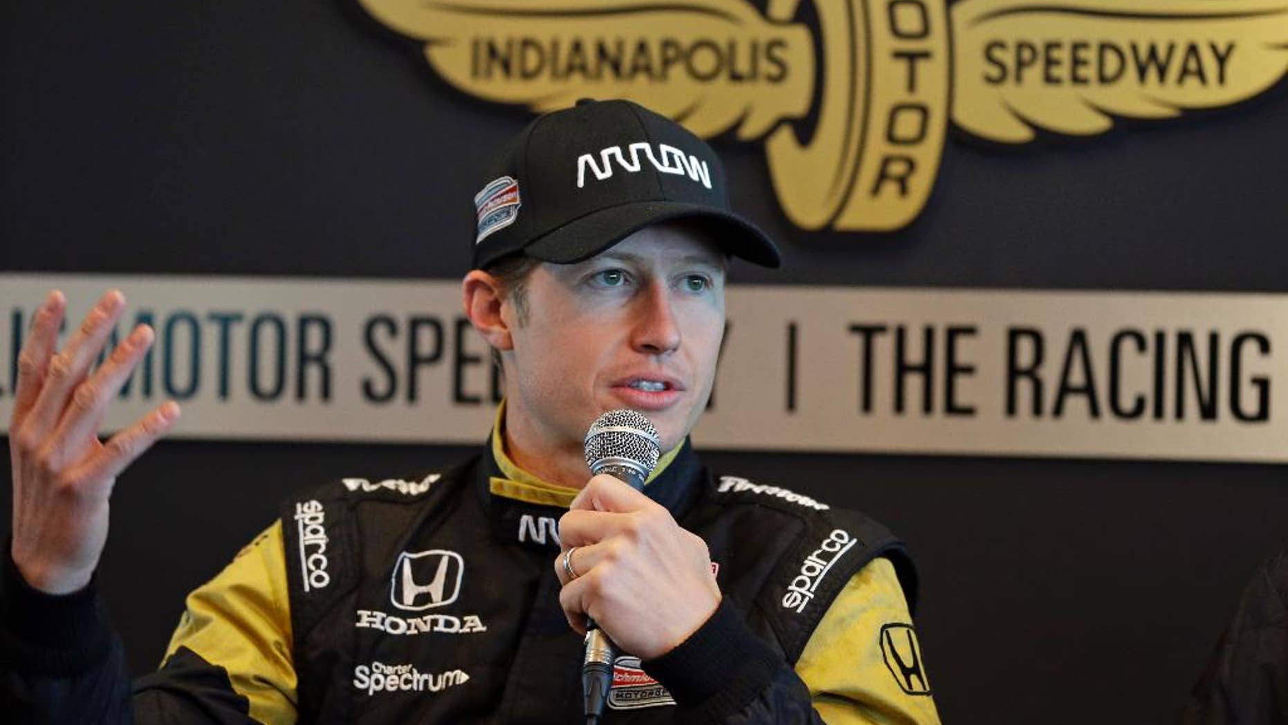 Ryan Briscoe, of Australia, answers a question about replacing James Hinchcliffe for the Indianapolis 500 auto race during a press conference at Indianapolis Motor Speedway in Indianapolis, Thursday, May 21, 2015. Hinchcliffe was injured in a crash on Monday. (AP Photo/Michael Conroy)