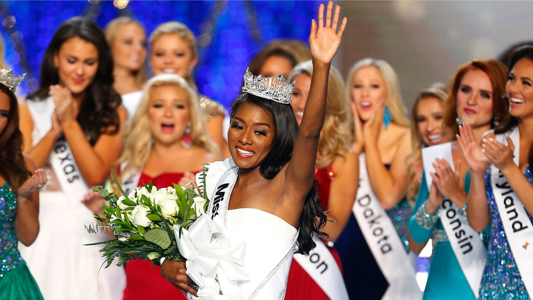 Miss New York Nia Franklin reacts after being named Miss America 2019, Sunday, Sept. 9, 2018, in Atlantic City, N.J. (AP Photo/Noah K. Murray)