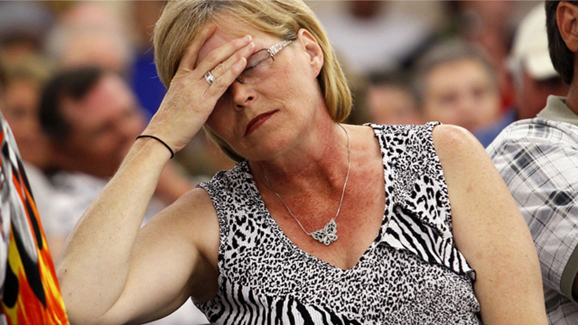 March 28: Brenda Guidry, of Larose, La. holds her head in frustration during a public meeting with BP claims fund administrator, Ken Feinberg