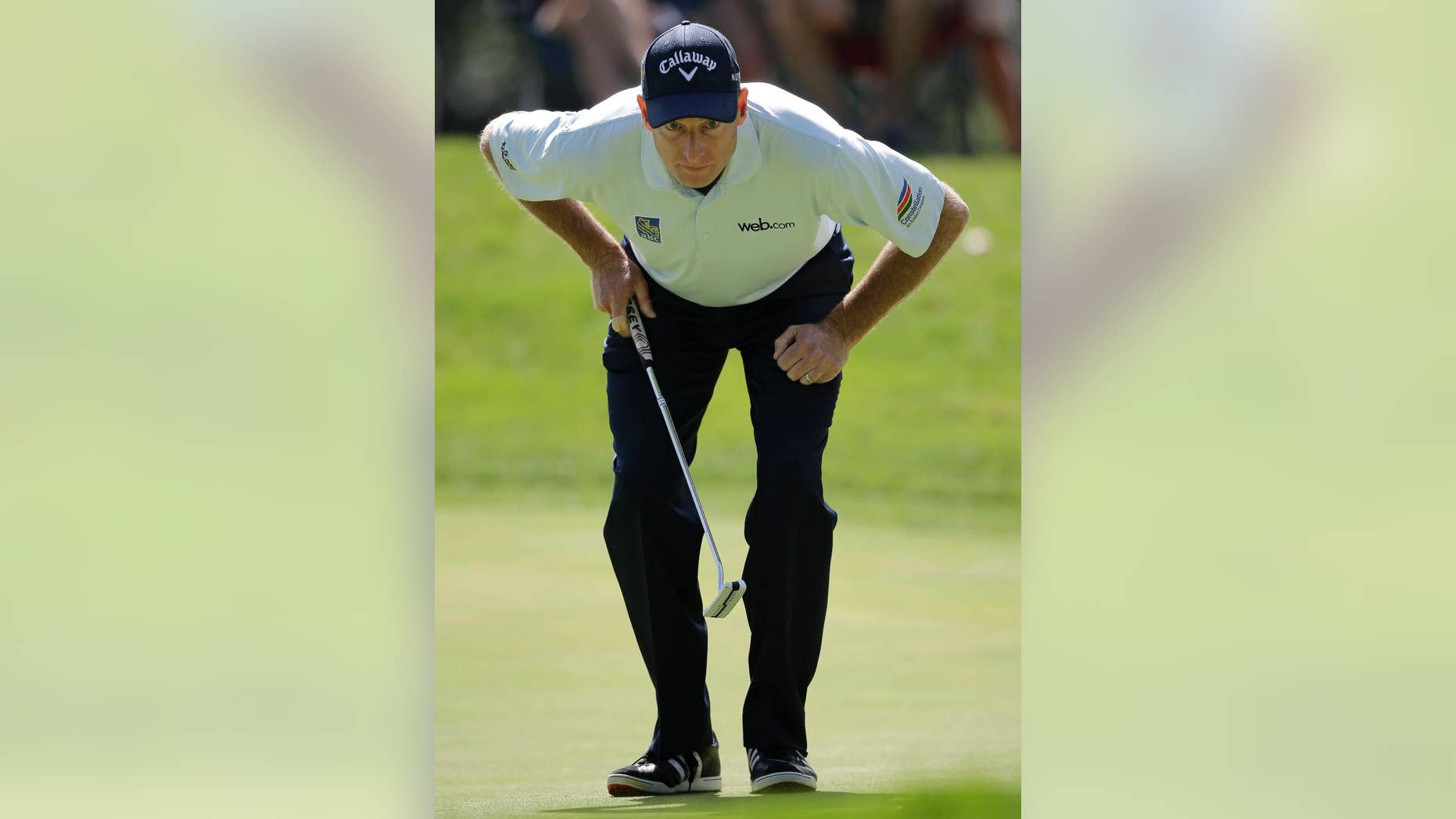 Jim Furyk lines up the putt on the 11th hole during the second round of the Bridgestone Invitational golf tournament at Firestone Country Club, Friday, Aug. 7, 2015, in Akron, Ohio. (AP Photo/Tony Dejak)
