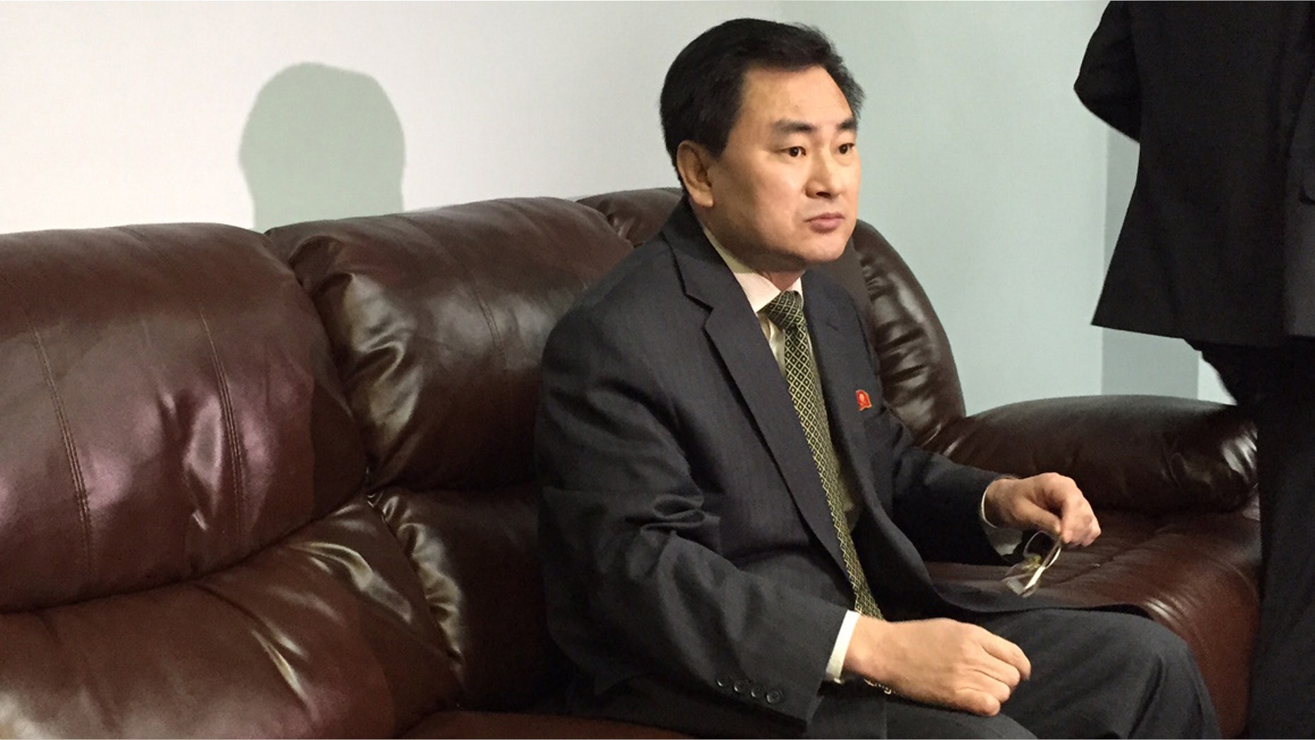 North Koreaâs deputy permanent representative to the United Nations, An Myong Hun, waits to speak to reporters at North Koreaâs U.N. mission in New York, Wednesday April 8, 2015. Hun said Mexico has "forcibly detained" one of its ships months after it ran aground off Mexico's Gulf coast and that his country will take unspecified "necessary measures to make the ship leave immediately." An Myong Hun said the ship, the Mu Du Bong, was not carrying anything prohibited by U.N. sanctions and that more than 50 crew remain on board. (AP Photo/Cara Anna)