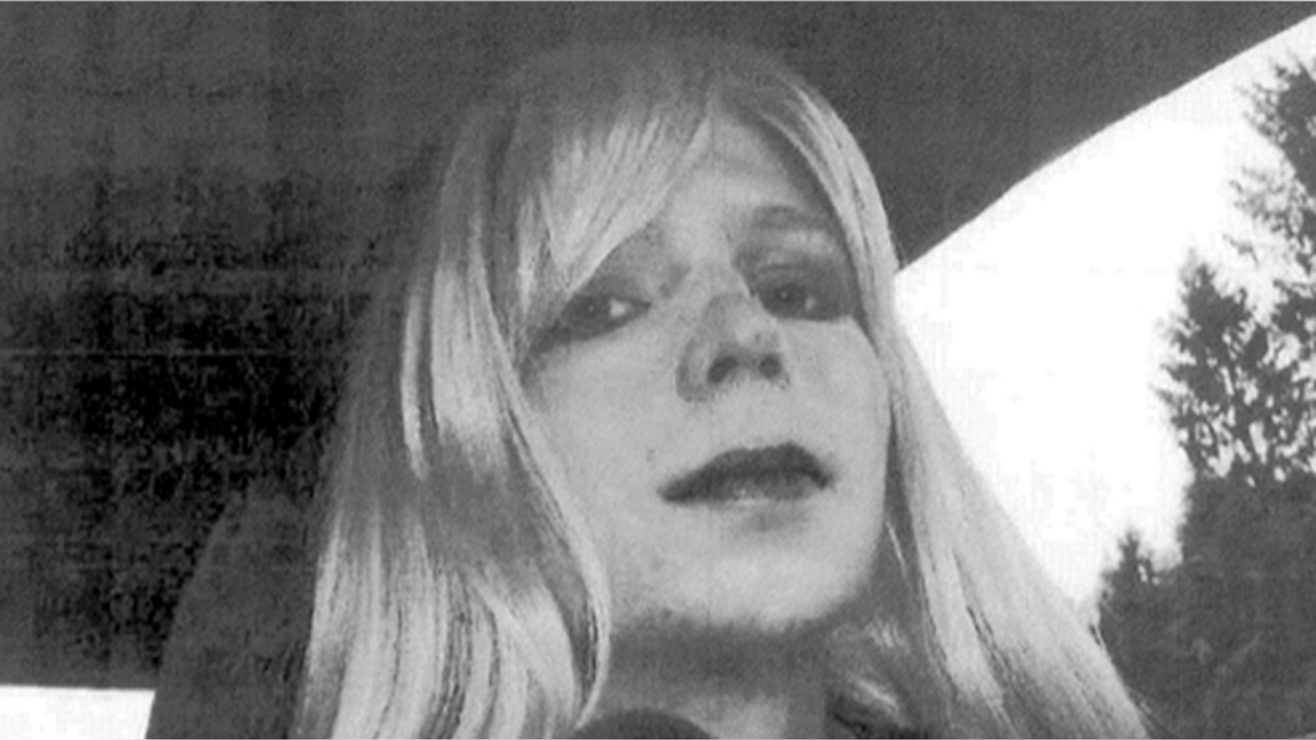 In this undated photo provided by the U.S. Army, Pfc. Chelsea Manning poses for a photo wearing a wig and lipstick. Manning emailed his military therapist the photo with a letter titled, "My problem," in which he described his issues with gender identity and his hope that a military career would "get rid of it." (AP/U.S. Army)