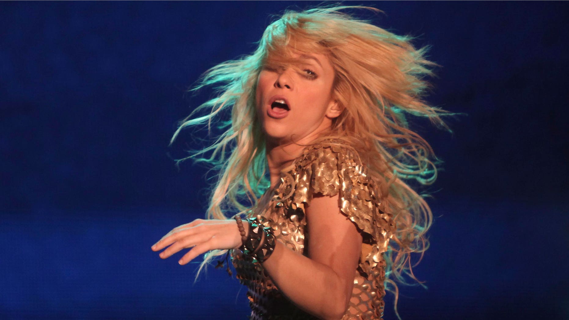 Colombian pop star Shakira performs in concert during her The Sun Comes Out World Tour in Mexico City, Saturday April 2, 2011. (AP Photo/Miguel Tovar)
