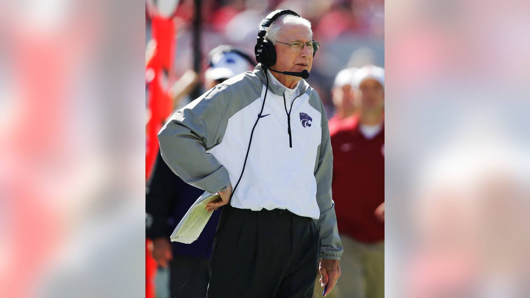 Kansas State head coach Bill Snyder watches from the sidelines during the second quarter of an NCAA college football game against Oklahoma in Norman, Okla., Saturday, Oct. 18, 2014. Kansas State won 31-30. (AP Photo/Sue Ogrocki)