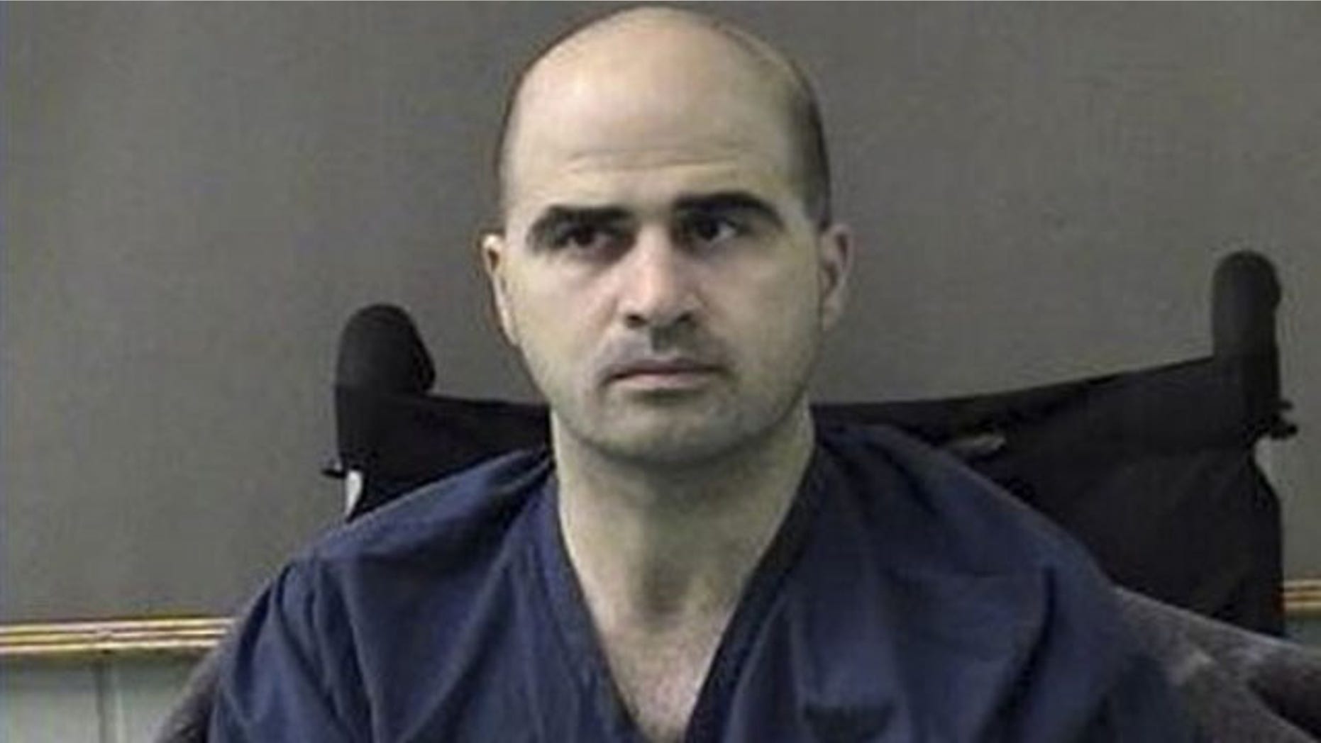 April 9: In this photo released by the Bell County Sheriffs Department, U.S. Major Nidal Hasan is shown after being moved from Brooke Army Medical Center in San Antonio to Bell County Jail in Belton, Texas.