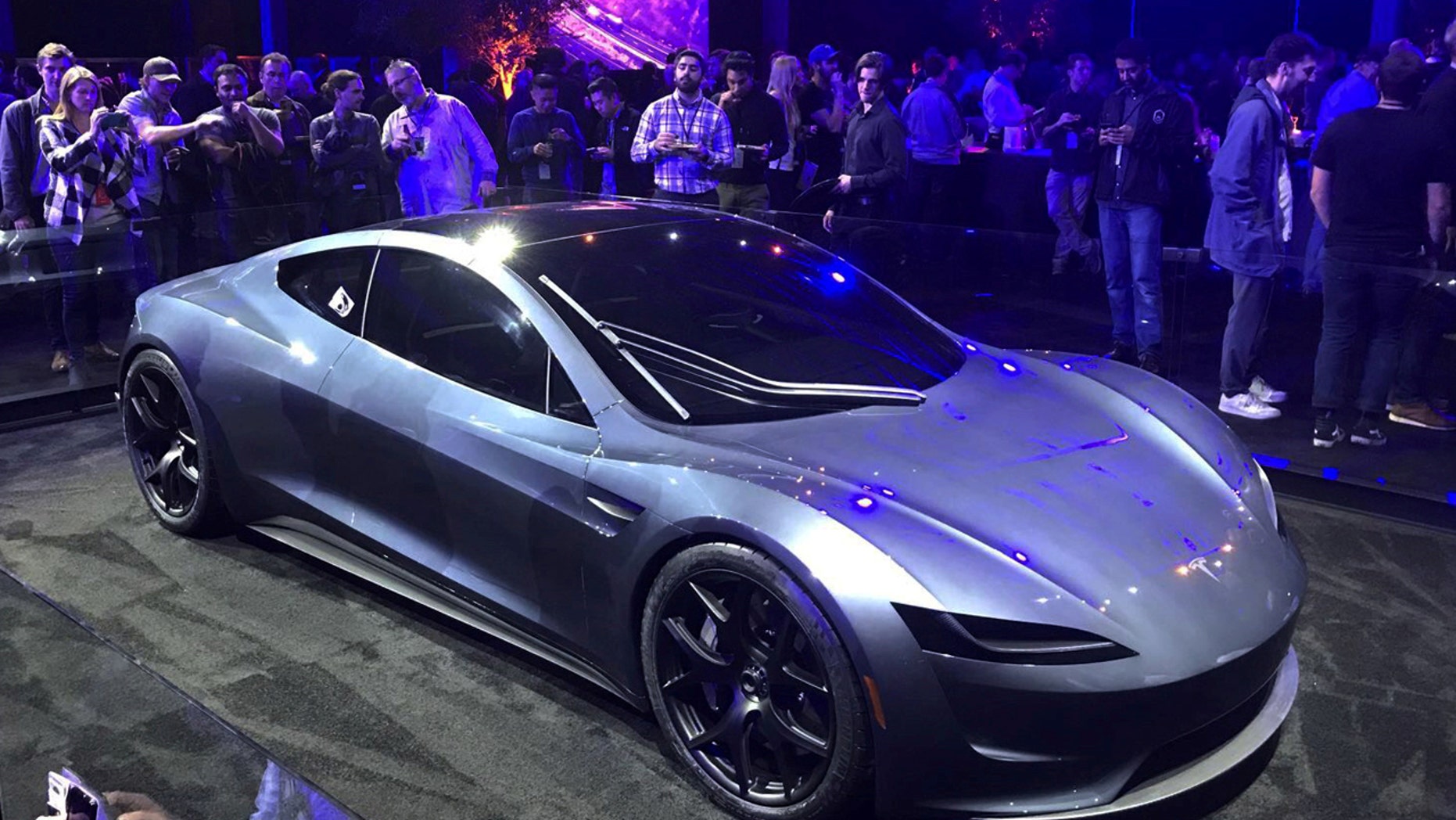 Tesla S New Roadster Will Deliver Smackdown To Gasoline Tesla Unveiled A New 200 000 Roadster Capable Of Going 0 To 60 Miles Per Hour In