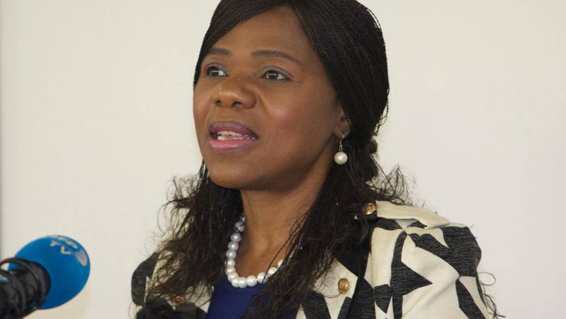 Public Protector, Thuli Madonsela, addresses journalists in Johannesburg, Tuesday, June 7, 2016. Madonsela, whose term ends in October, said that she has asked the government for more resources to investigate allegations that a wealthy Indian business family influenced President Jacob Zuma's choice of Cabinet ministers. (AP Photo/Stuart Graham)