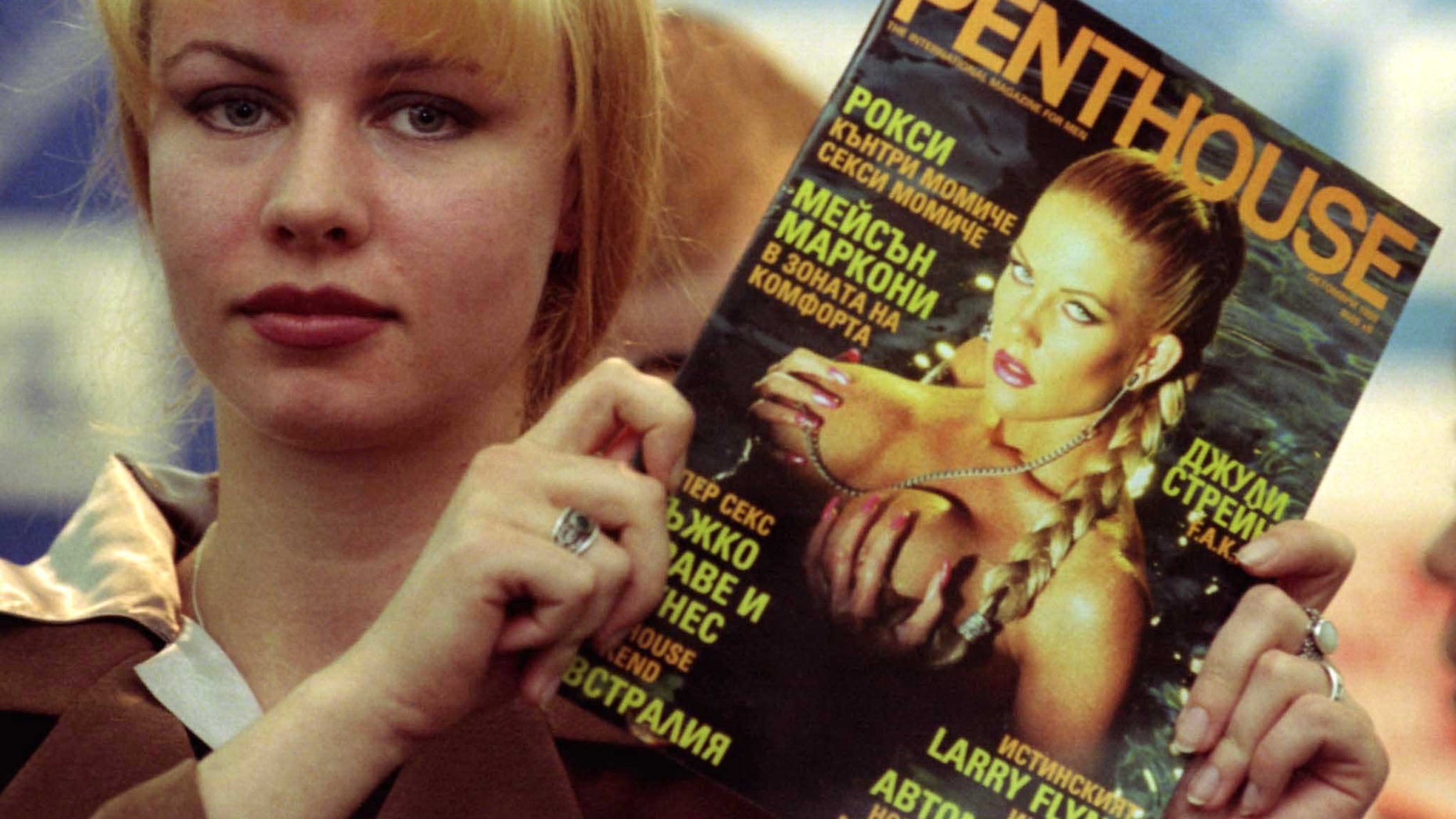A model poses with the first issue of the Bulgarian edition of Penthouse monthly magazine in Sofia September 17. This is the first international erotic magazine to be issued in the Balkan state after the collapse of communism in 1989. Dozens of local pornographic magazines have hit the newsstands since then.EK/ME - RTRHD9D