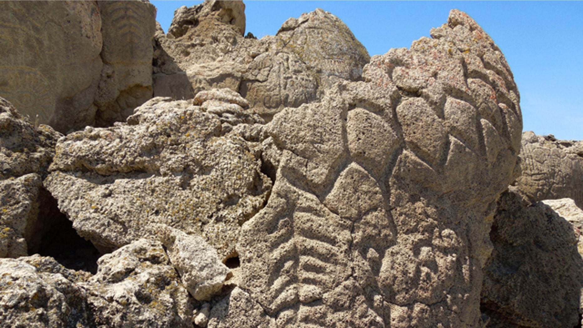 Ancient carvings on limestone boulders in northern Nevada's high desert near Pyramid Lake.