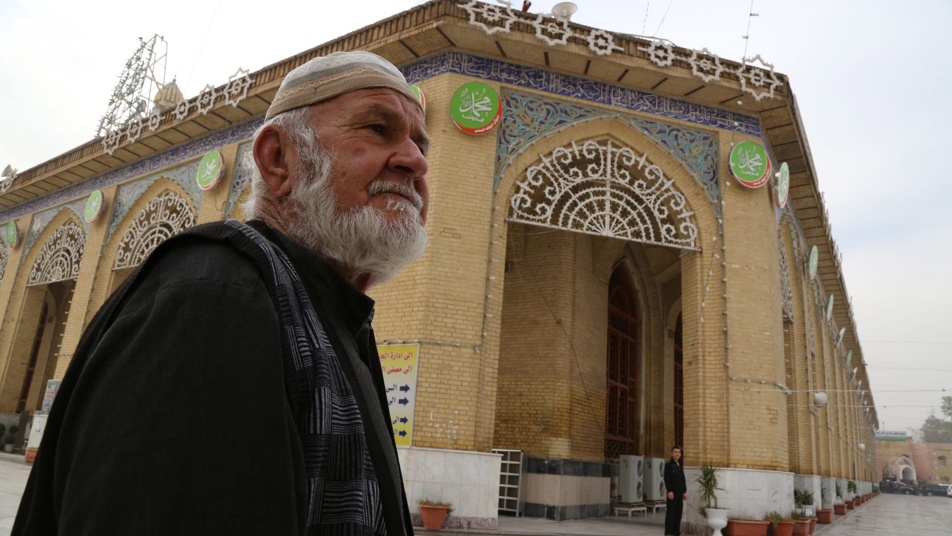 A Sunni worshiper leaves the Sunni Abu Hanifa mosque after he finds out it is closed at Azamiya area in north Baghdad, Iraq, Saturday, Nov. 23, 2013. Sunni religious leaders said on Saturday that they have decided to close down the sect’s mosques in Baghdad indefinitely to protest attacks targeting clerics and worshippers, highlighting Iraq’s deepening sectarian rift. (AP Photo/Karim Kadim)