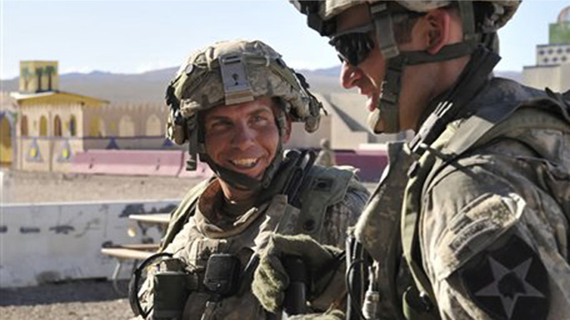 Aug. 23, 2011: In this Defense Video & Imagery Distribution System photo, soldiers from Blackhorse Company, 2nd Battalion, 3rd Infantry Regiment, 3rd Stryker Brigade Combat Team, 2nd Infantry Division, including Staff Sgt. Robert Bales, left, take part in exercise at the National Training Center at Fort Irwin, Calif.