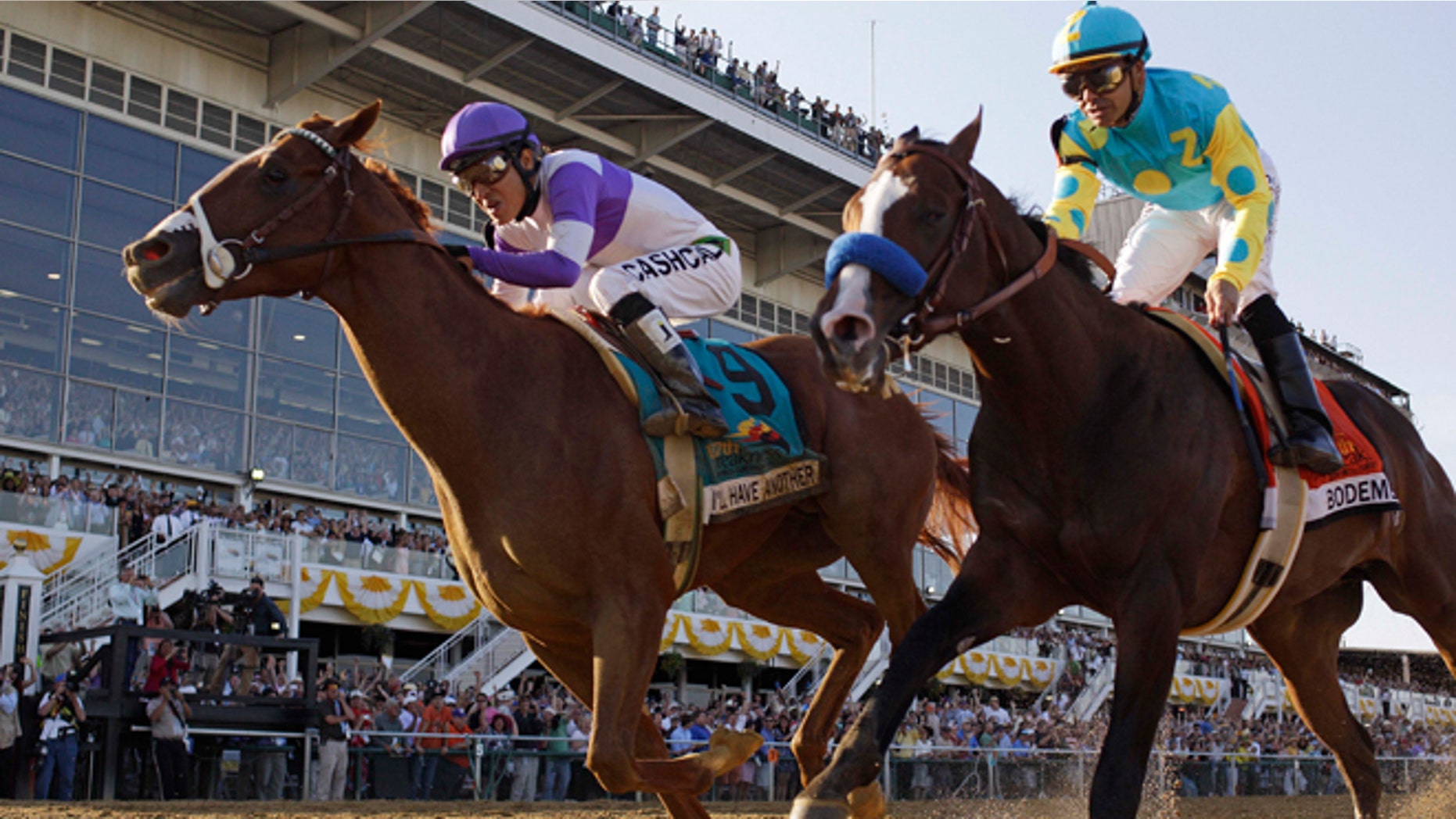 I'll Have Another (9), ridden by Mario Gutierrez, beats Bodemeister, ridden by Mike Smith, to the finish line to win the 137th Preakness Stakes horse race at Pimlico Race Course, Saturday, May 19, 2012, in Baltimore.(AP Photo/Matt Slocum)