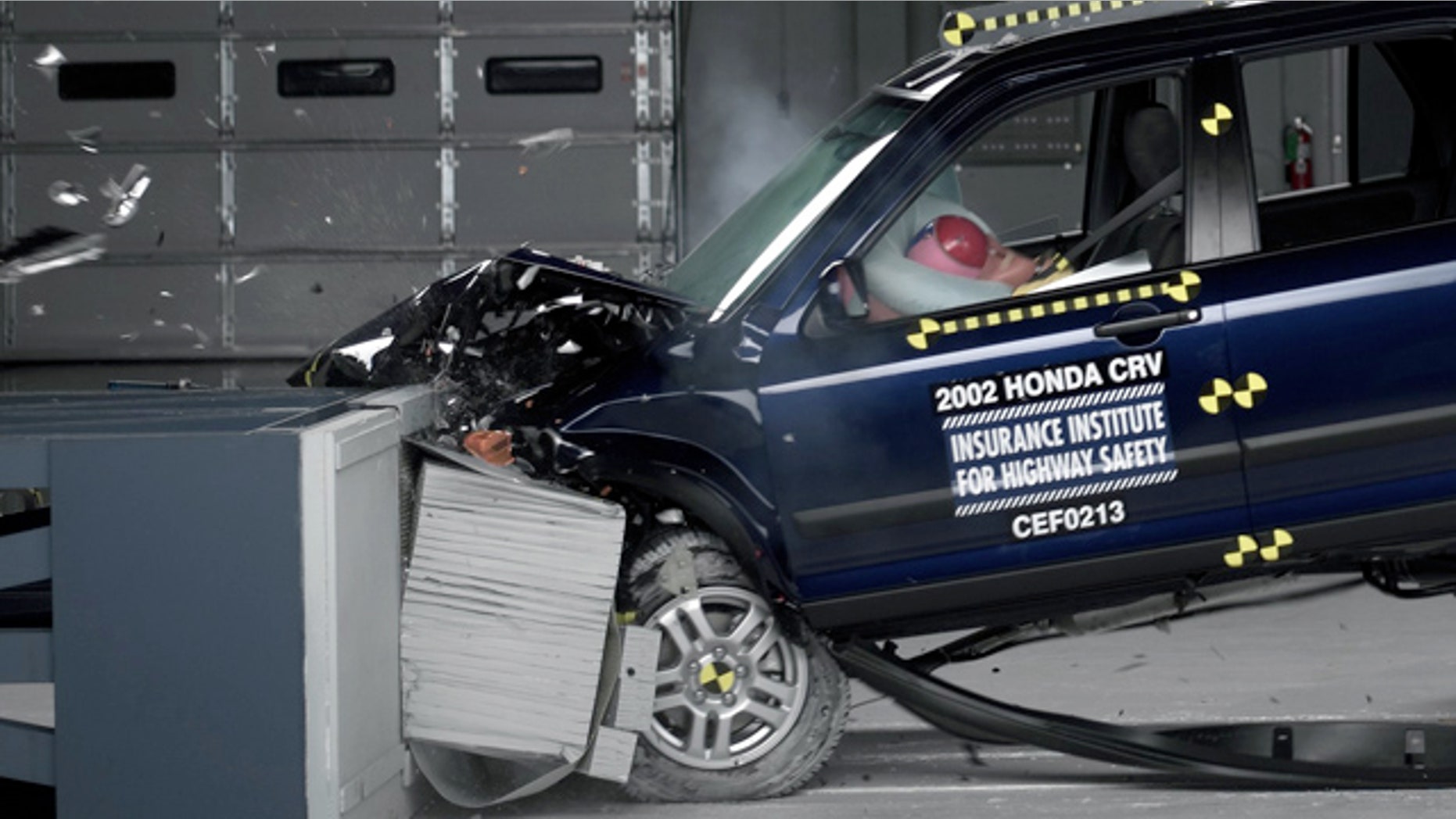 This undated photo provided by the Insurance Institute for Highway Safety shows a crash test of a 2002 Honda CR-V, one of the models subject to a recall to repair faulty air bags. The federal government is demanding that the auto industry recall millions of additional cars equipped with faulty air bags that can injure and even kill a driver. (AP Photo/Insurance Institute for Highway Safety)