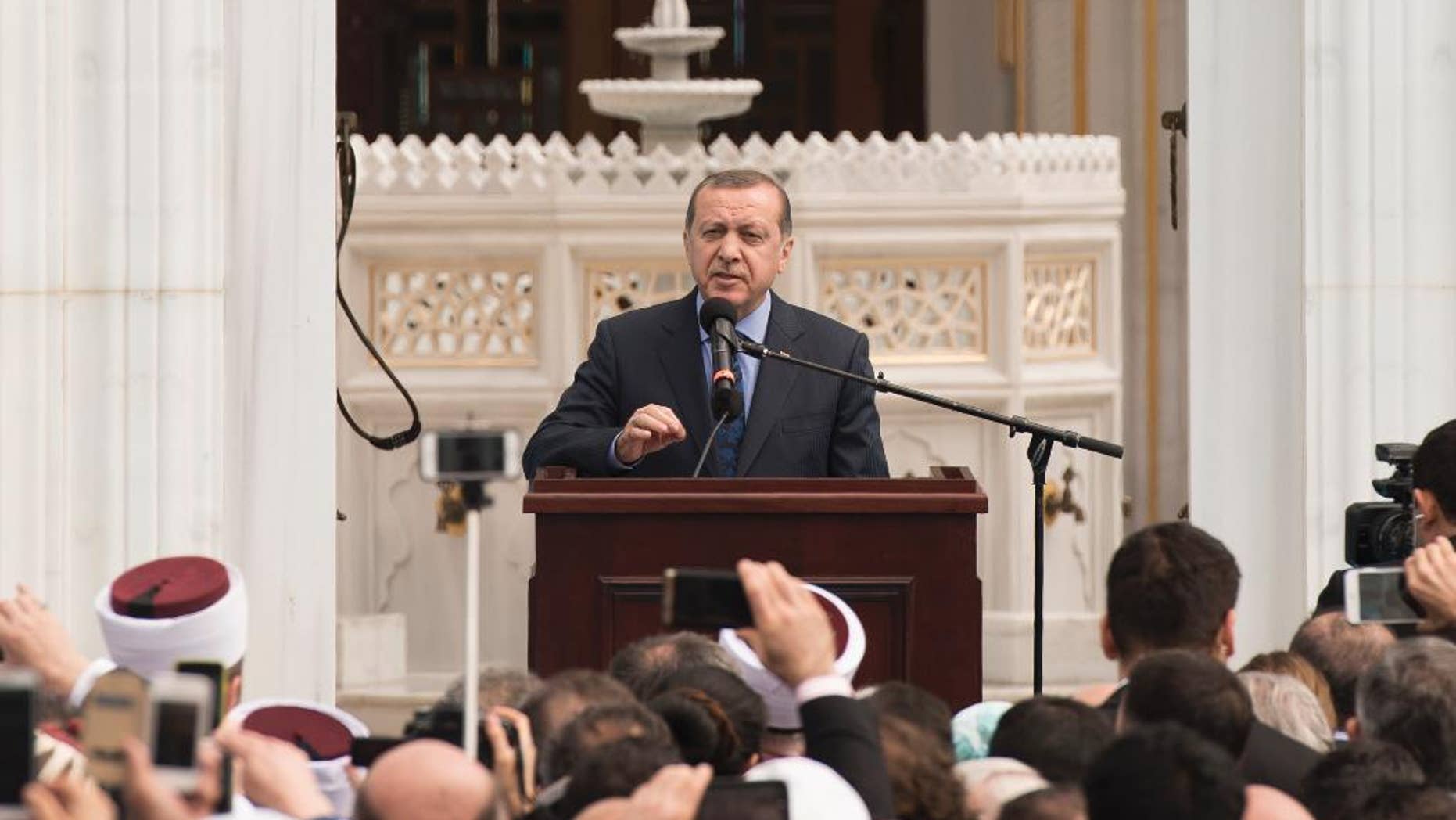 Turkish President Recep Tayyip Erdogan speaks at the inauguration of the Diyanet Center of America in Lanham, Md., on Saturday, April 2, 2016. (AP Photo/Sait Serkan Gurbuz)