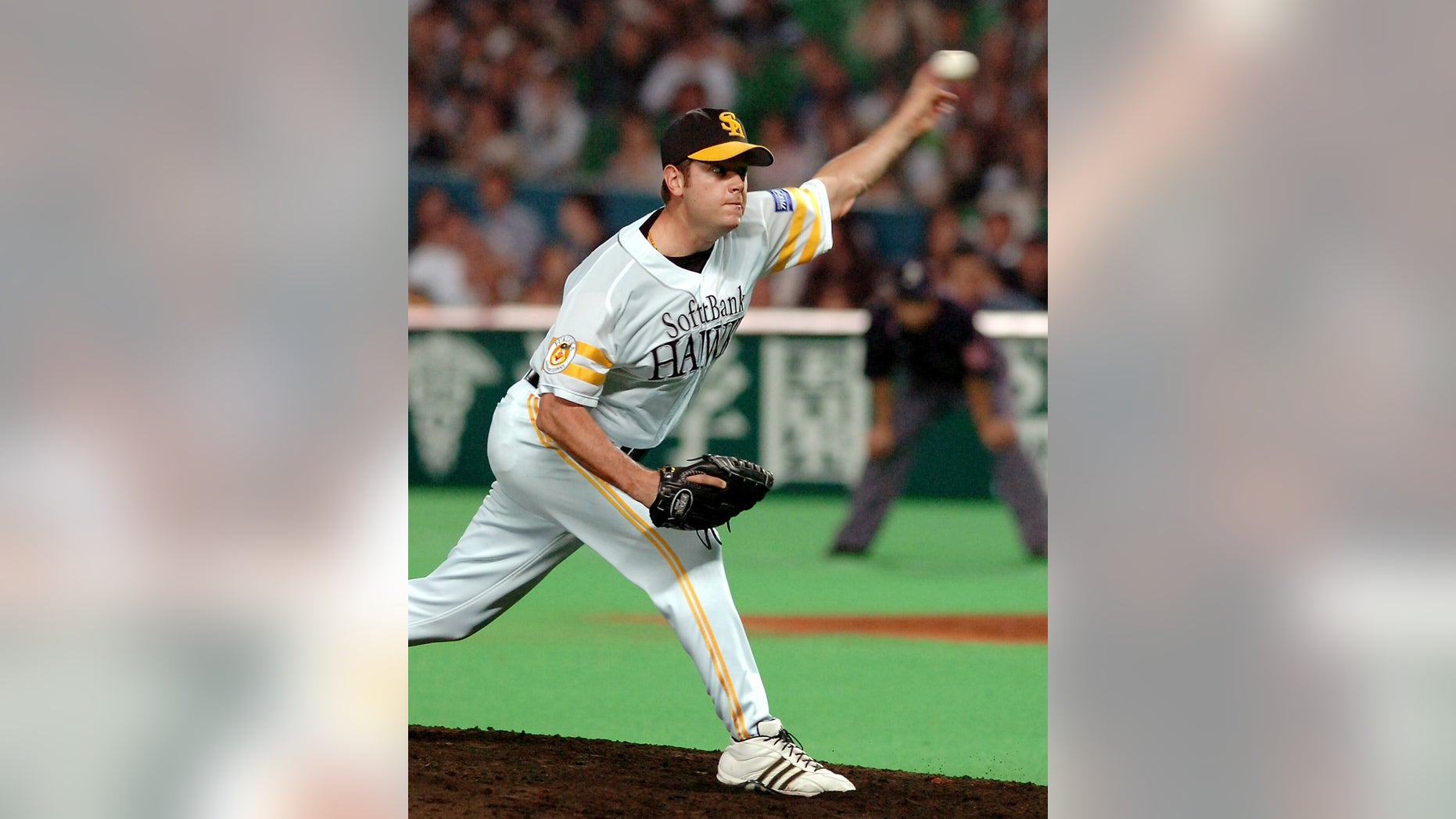 FILE - In this May 2, 2007, file photo, Fukuoka SoftBank Hawks pitcher C.J. Nitkowski throws against the Tohoku Rakuten Golden Eagles during the eighth inning of a baseball game at Yahoo! Dome in Fukuoka, southwestern Japan. (AP Photo/Nikkan Sports, Satoshi Tameda, File) JAPAN OUT; ONLINE OUT; NO SALES; MANDATORY CREDIT