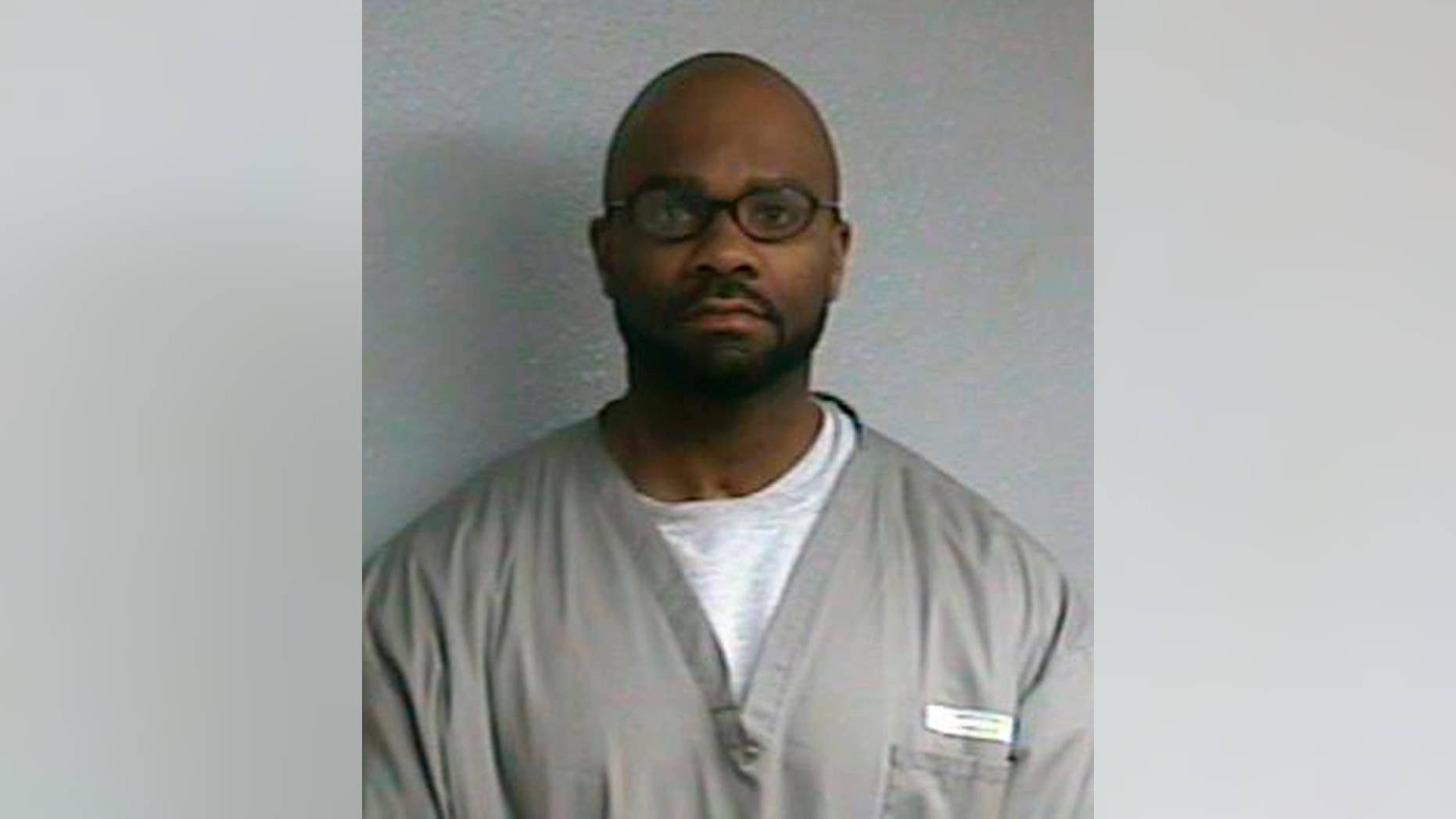 FILE- This March 6, 2015, file photo provided by the Oklahoma Department of Corrections shows Demarco Carpenter, also known as Demarchoe Carpenter. An Oklahoma judge on Monday, May 9, 2016, has declared that Carpenter and another men who were convicted in the drive-by shooting death of a woman 22 years ago are innocent and vacated their convictions. (Oklahoma Department of Corrections via AP, File)