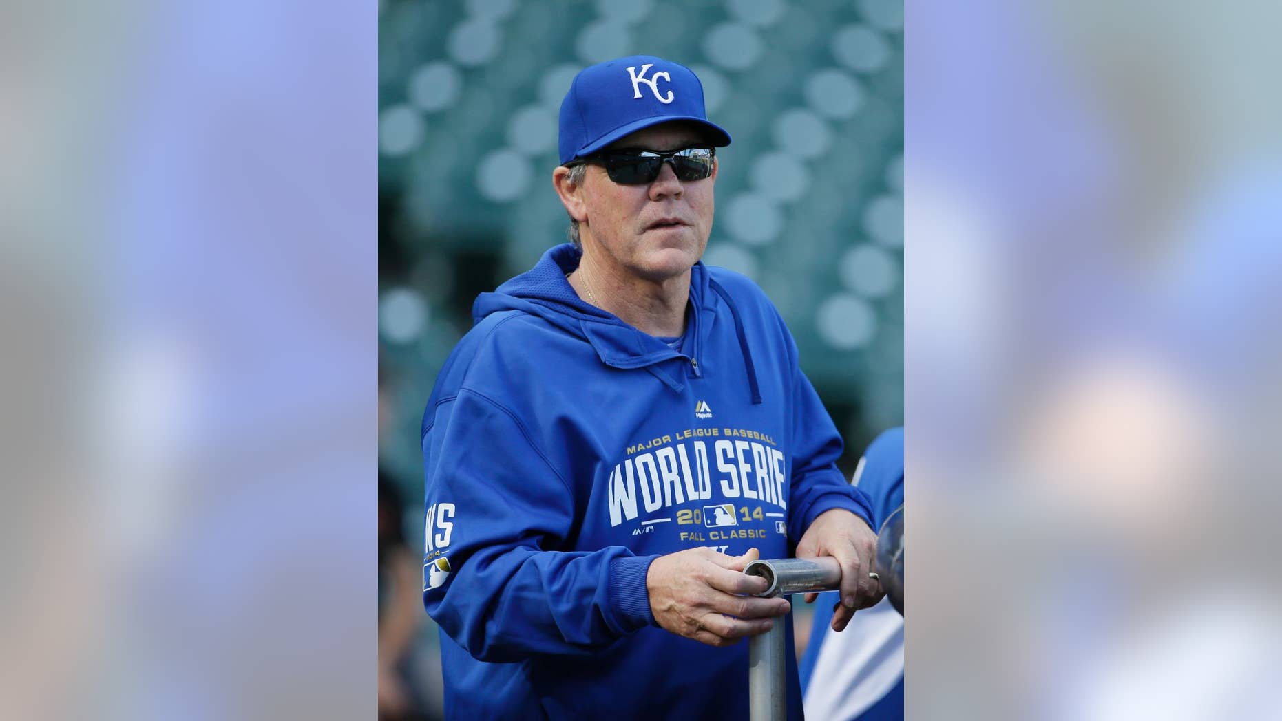 Kansas City Royals manager Ned Yost watches his team take batting practice during a baseball workout on Thursday, Oct. 23, 2014, in San Francisco. The Royals and the San Francisco Giants are to play Game 3 of baseball's World Series in San Francisco on Friday. (AP Photo/Eric Risberg)