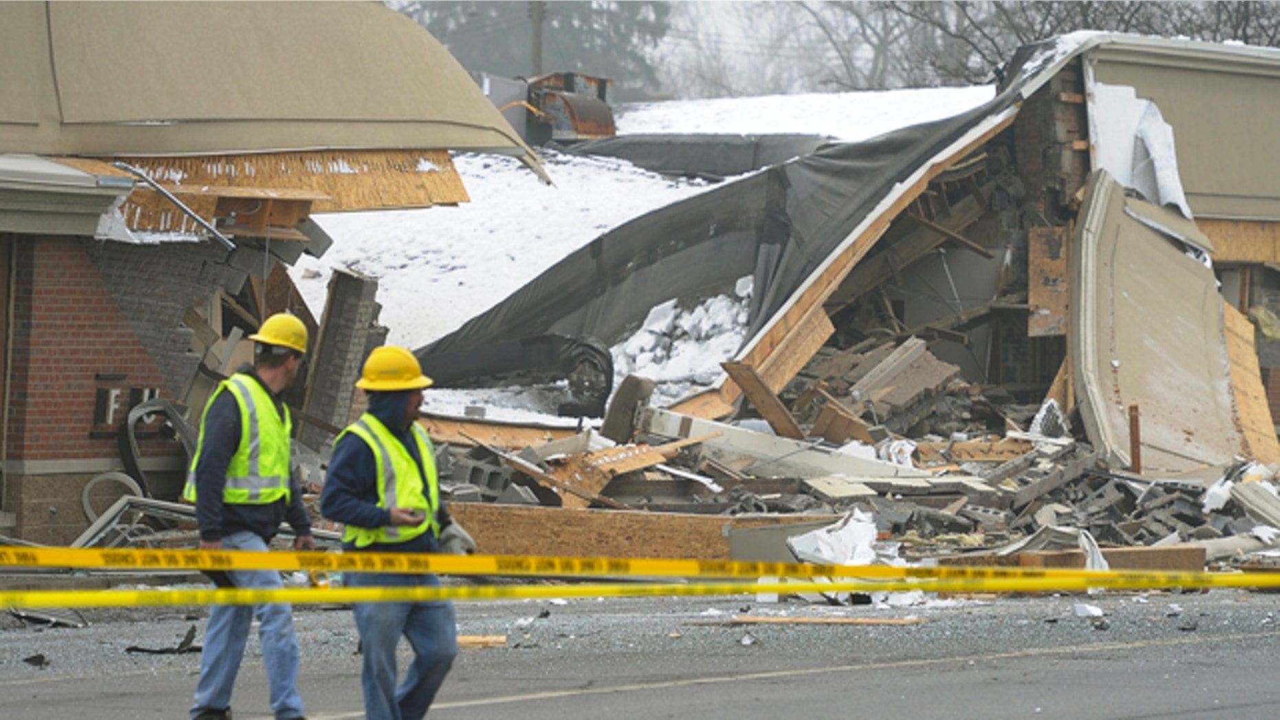 Dec. 29: Emergency personnel are on the scene after an explosion and collapse at the William C. Franks furniture store in Wayne, Mich.