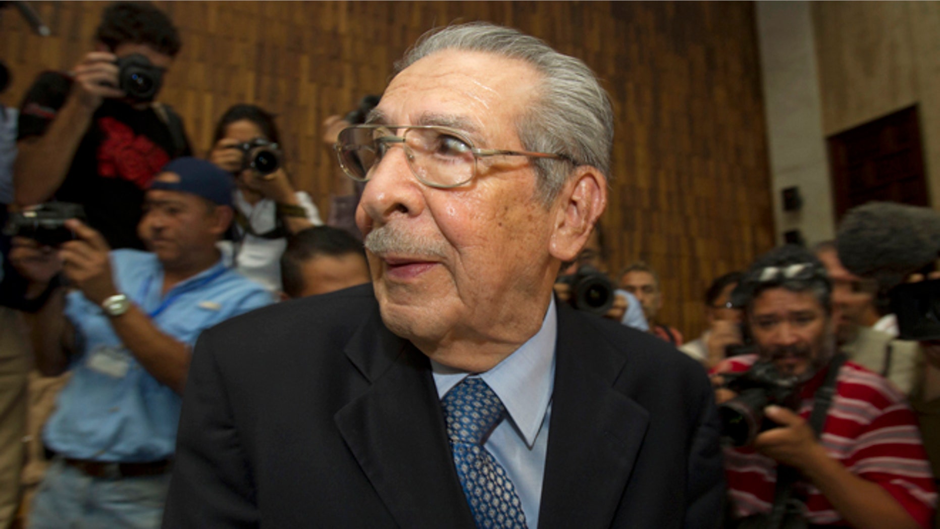 FILE - In this Friday, May 10, 2013 file photo, Guatemala's former dictator Jose Efrain Rios Montt wears headphones as he listens to the verdict in his genocide trial in Guatemala City.