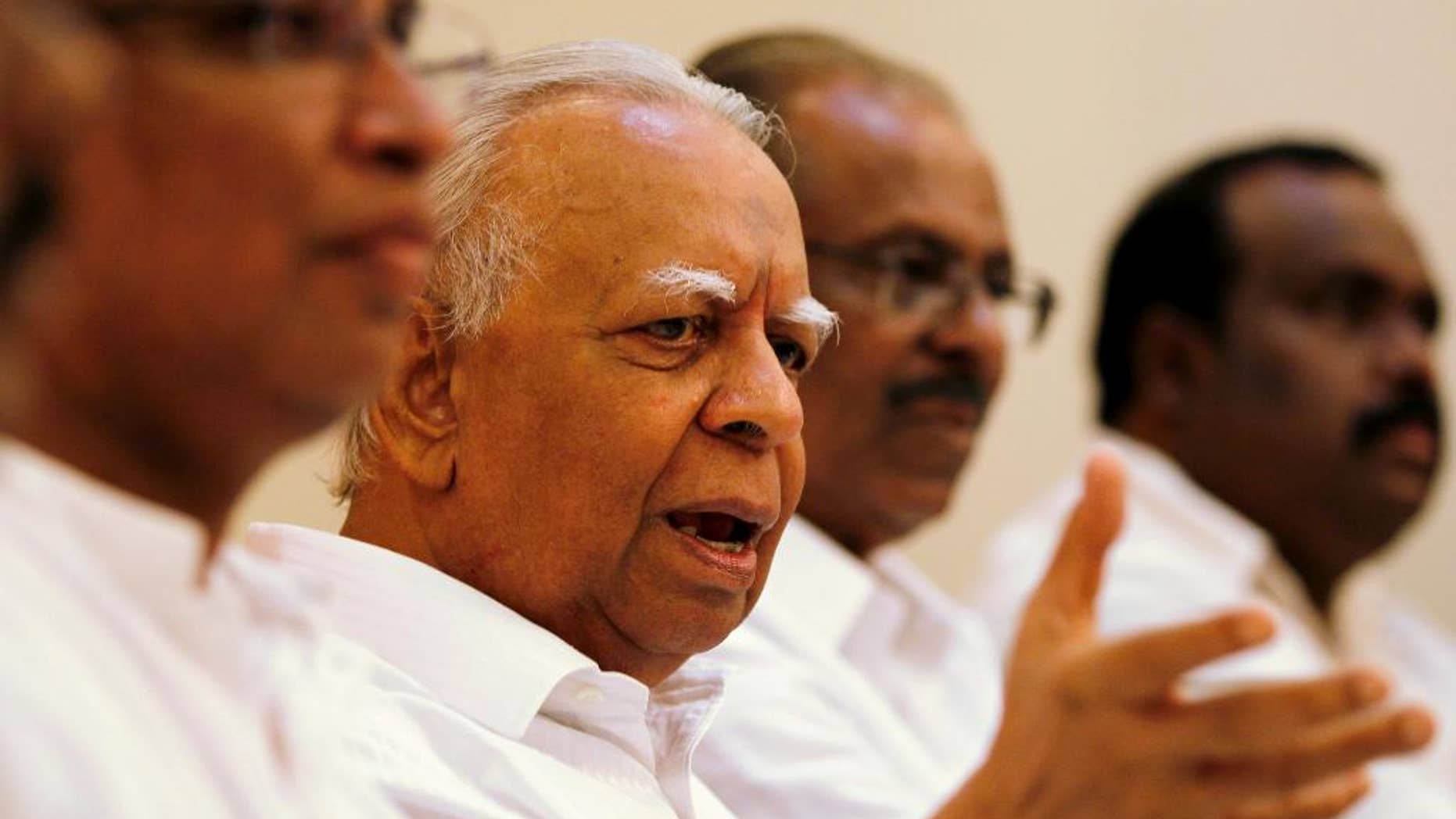 Tamil National Alliance leader Rajavarothayam Sampanthan speaks during a media briefing in Colombo, Sri Lanka, Tuesday, Dec. 30, 2014. Sri Lanka's main ethnic Tamil political party said that it will support opposition candidate Maithripala Sirisena in January's presidential election, in the latest blow to Mahinda Rajapaksa's bid for a third term in office. (AP Photo/Eranga Jayawardena)