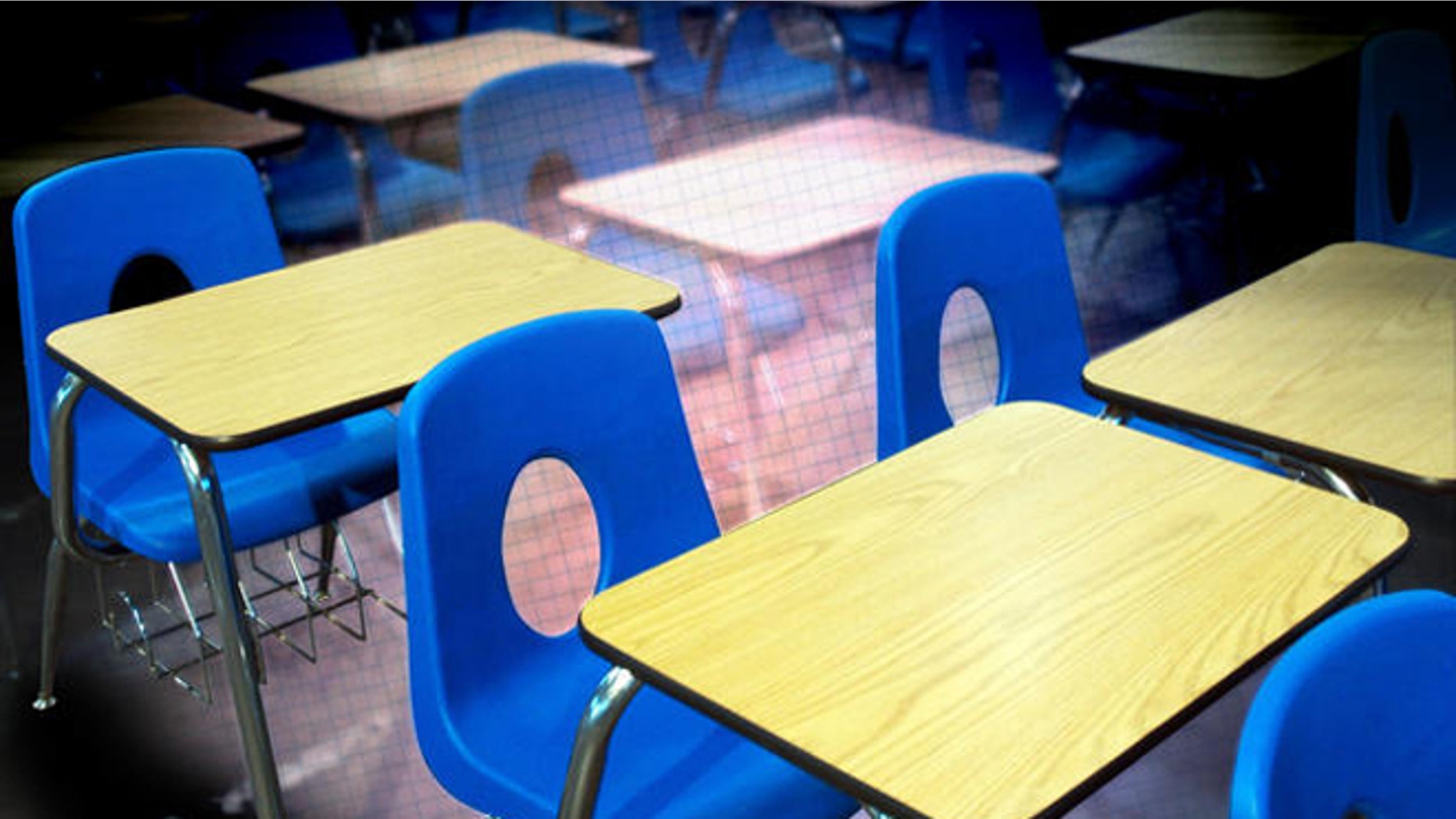 Classroom desks used at Decker College await auction Friday, Feb. 10, 2006 at the site of the former school in Louisville, Ky. Decker, a for-profit trade school run by former Massachusetts Gov. William Weld, is now closed, mired in bankruptcy proceedings and under FBI investigation in a case that has cast a long shadow over Weld's bid to become the next governor of New York. (AP Photo/Brian Bohannon)